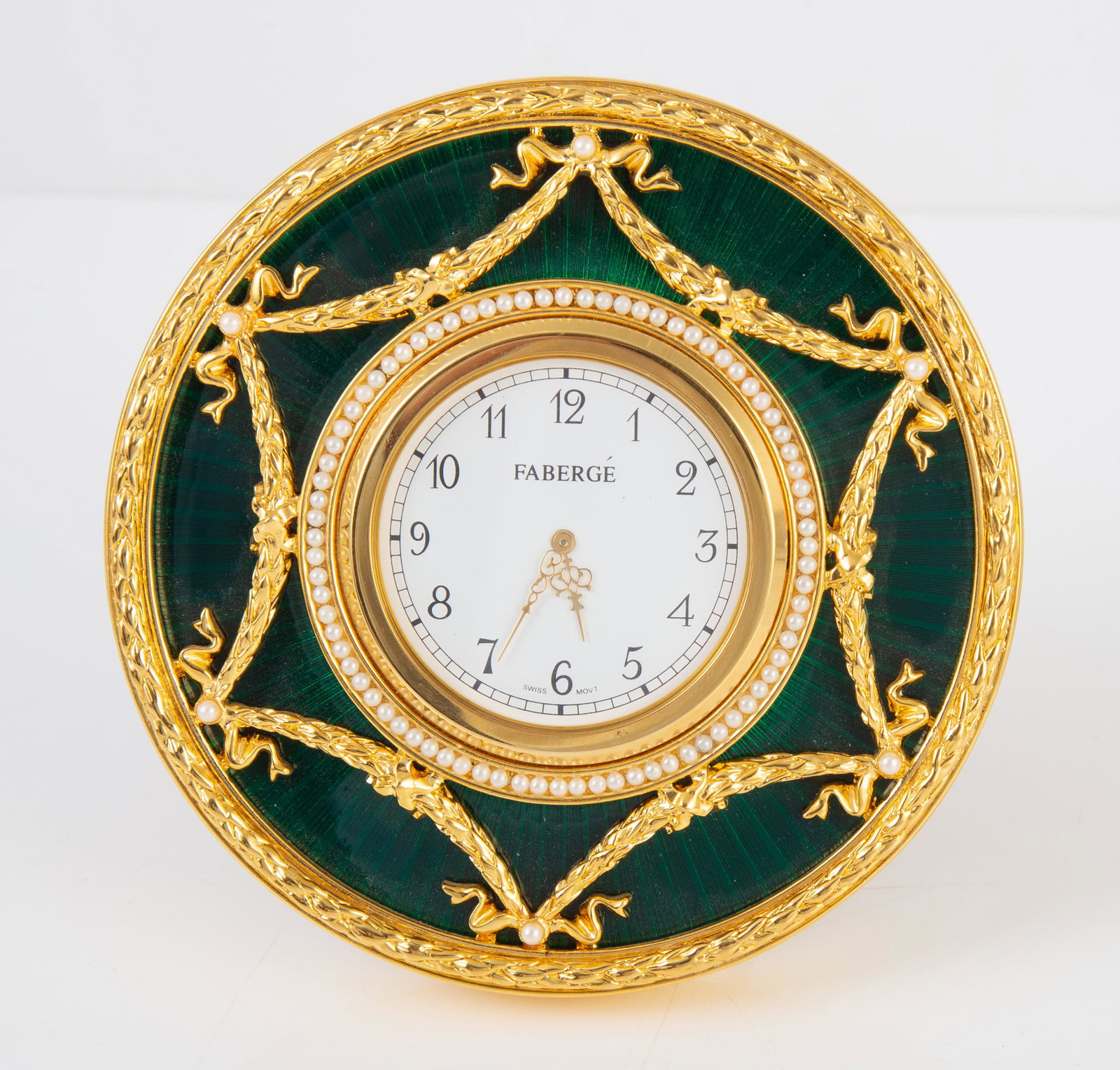 FABERGE GREEN ENAMEL DESK CLOCK with FITTED BOX: Goldtone with faux pearl accents; Swiss movement; untested; original velvet box has silk lining; Dia.-4 1/4", VG-EX