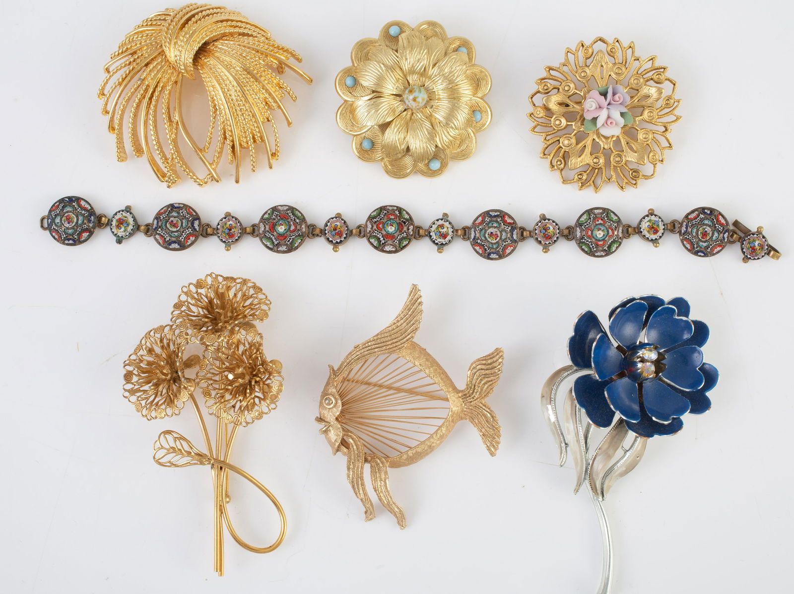 LOT OF (7) VINTAGE, SIGNED, ETC. JEWELRY: Includes: (1) Monet fish pin, (1) Monet flower pin, (1) Monet bow pin; (1) Coro enameled flower pin, (1) micromosaic bracelet, (1) Oranium Paris pin; (1) signed pin with porcelain flowers; some enamel