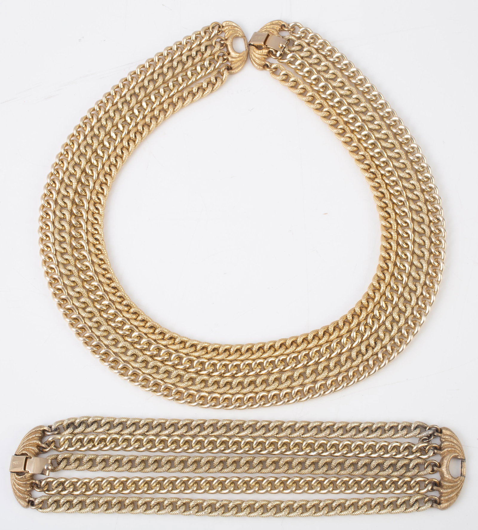 (2) MATCHING MONET NECKLACE & BRACELET: Gold tone, four strand chain necklace and matching bracelet, both signed Monet, necklace L-17", bracelet L-7 1/2", VG