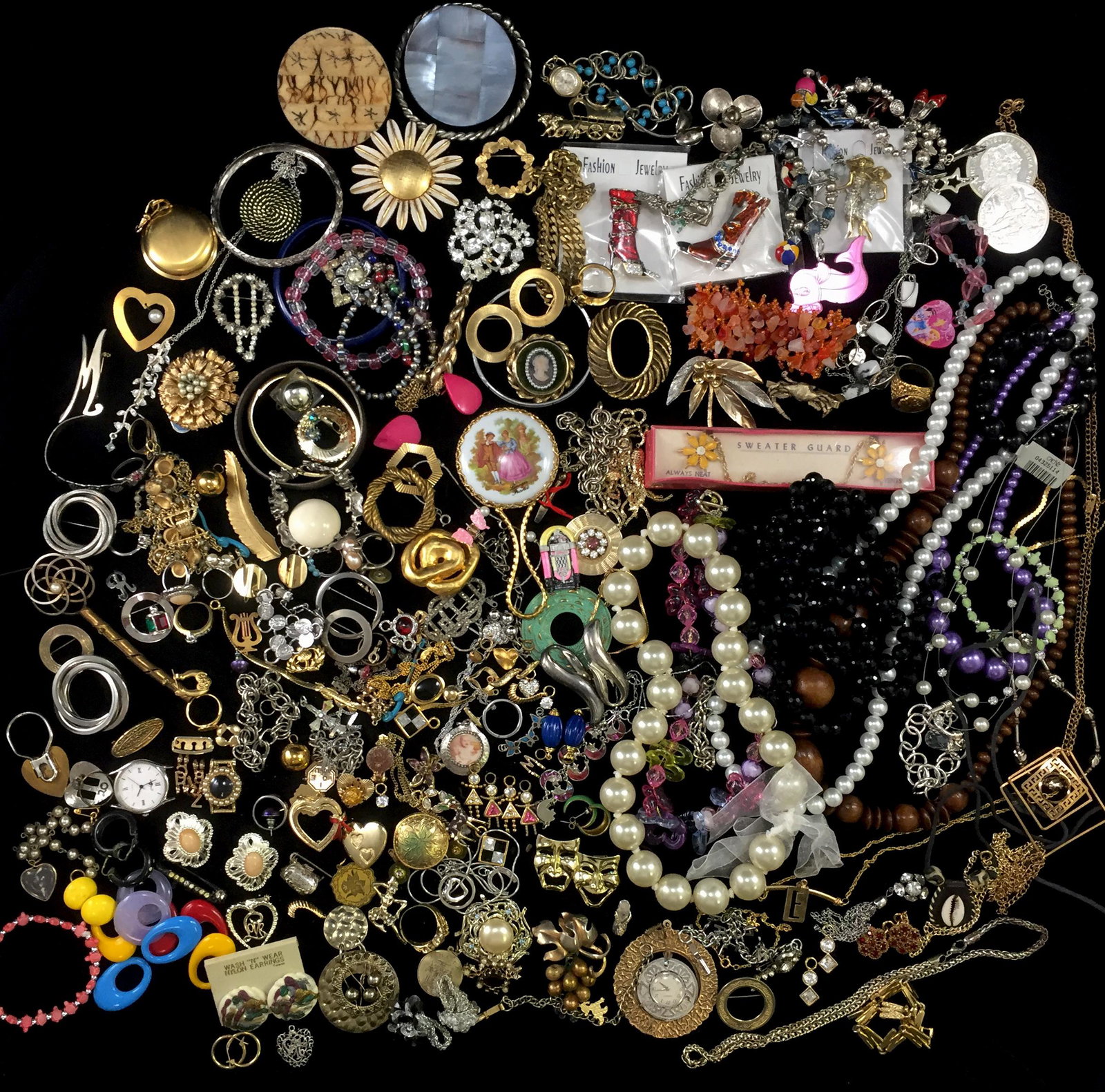 GRAB BAG ASSORTED COSTUME JEWELRY: Includes: pins, beads, earrings, chains, charm-style bracelets and more; some vintage; some more contemporary; sizes vary; G-VG