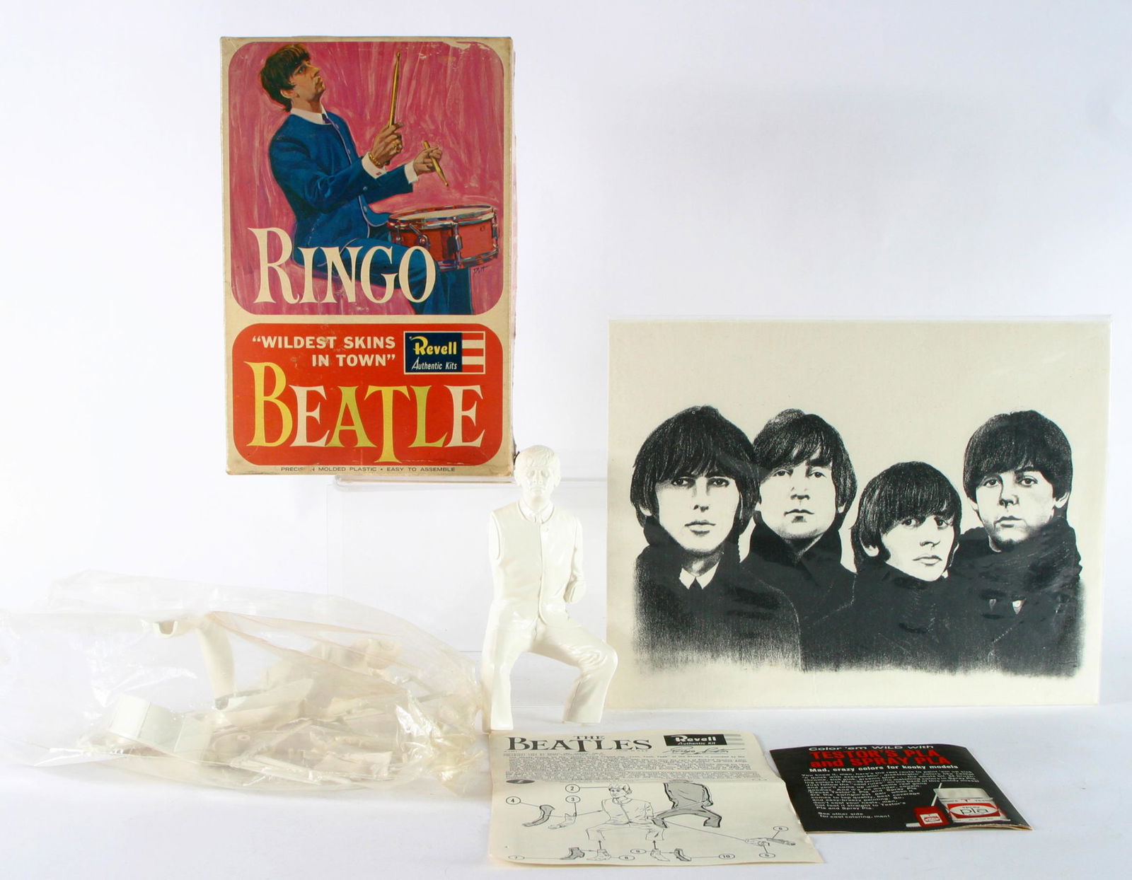 RINGO STARR REVELL MODEL & BEATLES LITHO: Revell model kit of Ringo Starr "Wildest Skins in Town"; appears complete; unassembled; box 9 1/2" x 6" x 2 1/4"; together with un-identified litho of the Beatles, unframed;