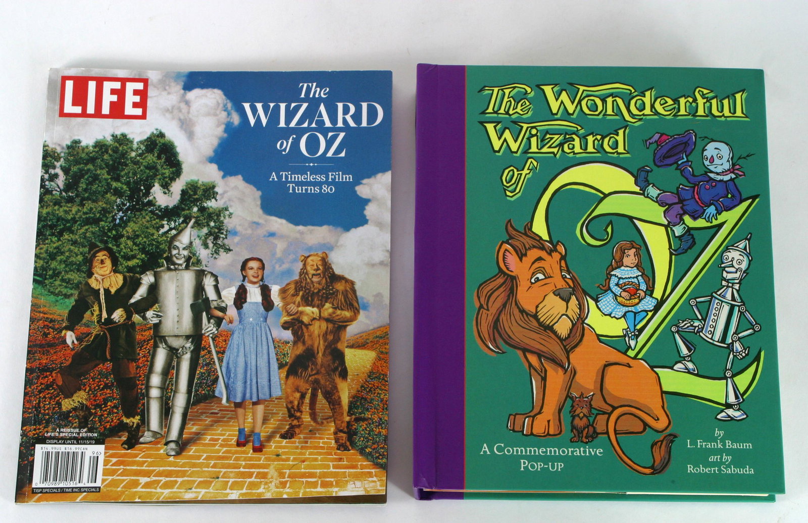 WIZARD OF OZ POP-UP BOOK & LIFE MAGAZINE: (1) "The Wonderful Wizard of Oz" book by L. Frank Baum; artwork by Robert Sabuda; "A Commemorative Pop-Up" copyright 2000, Little Simon of Simon & Schuster Children's Publishing Division; 10 1/4" x 8