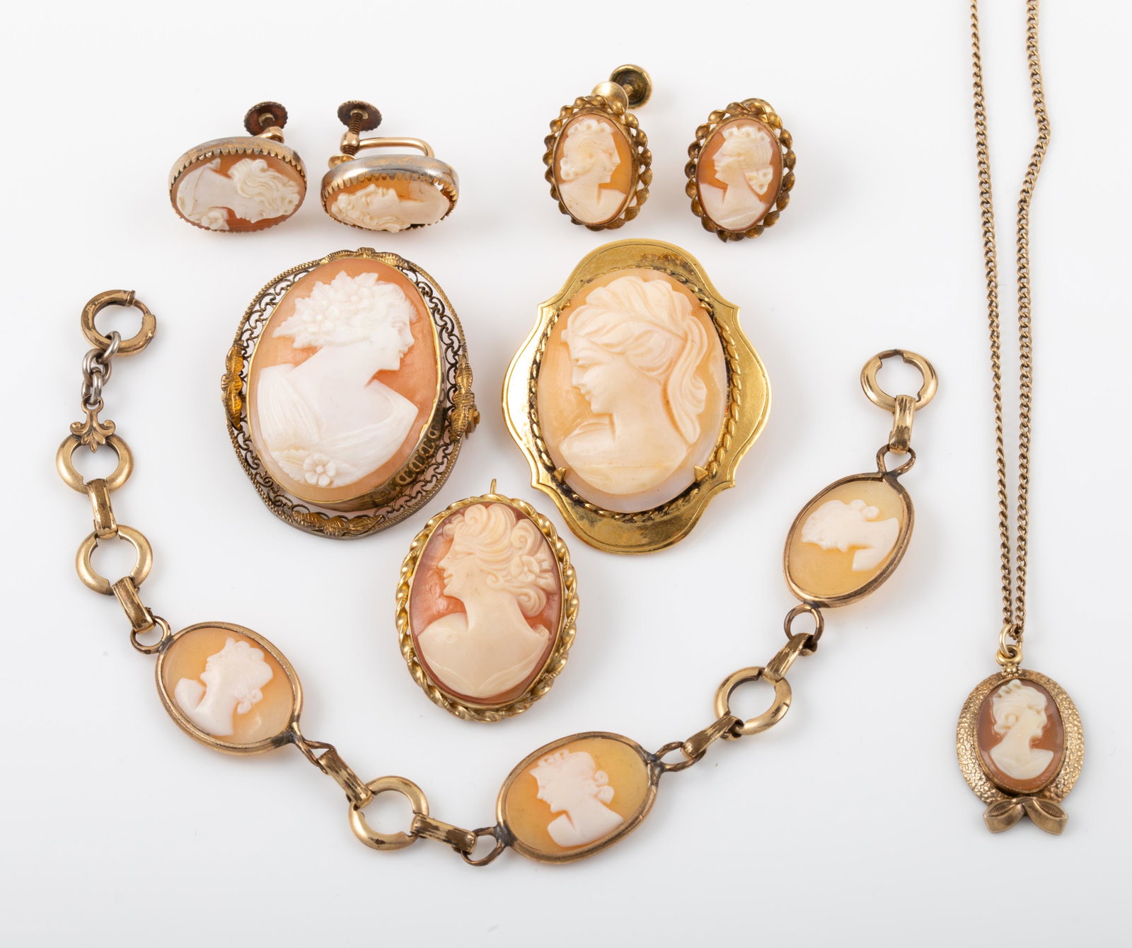 (7) CAMEO JEWELRY: Gold filled; includes: (1) chain with cameo drop, (1) bracelet, (3) brooches, (2) pairs screw back earrings; 1-brooch is slightly bent; overall normal wear; longest 15", G-VG