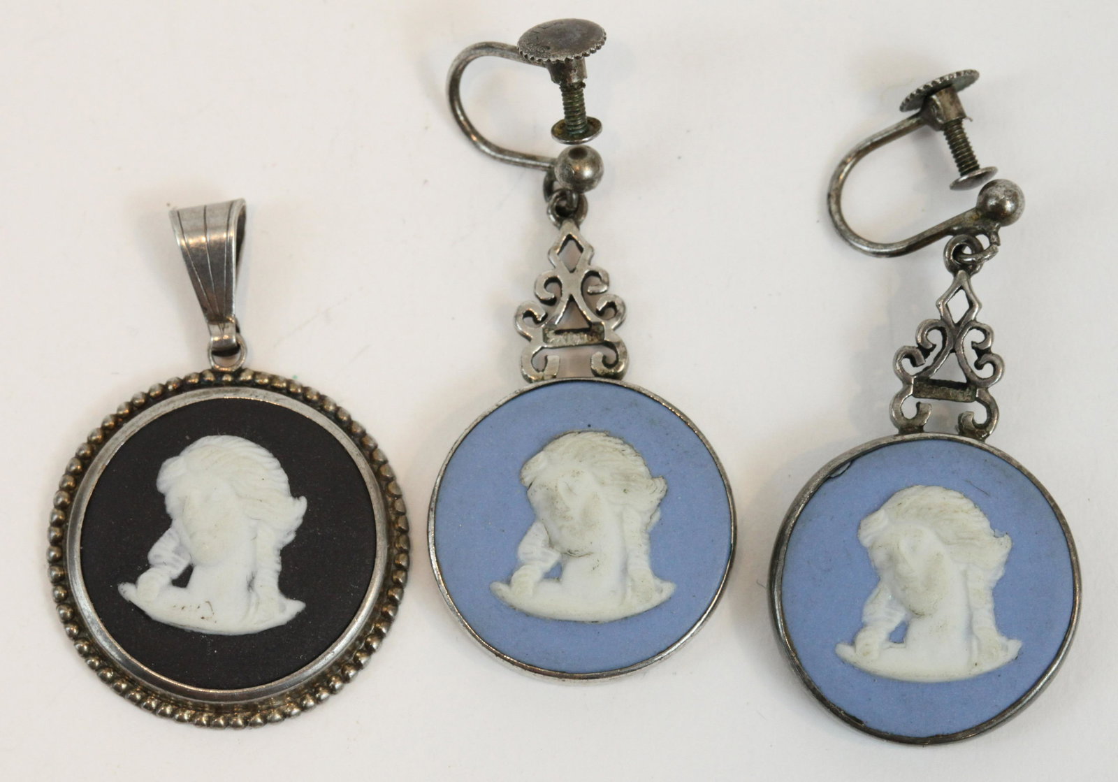 PAIR WEDGWOOD EARRINGS AND PENDANT: Pair of Wedgwood blue jasperware screw back earrings, set in sterling silver, with portrait roundels; (1) back and white jasperware pendant, matching portrait; earrings, L-1 3/8", pendant L-1 5/8 incl