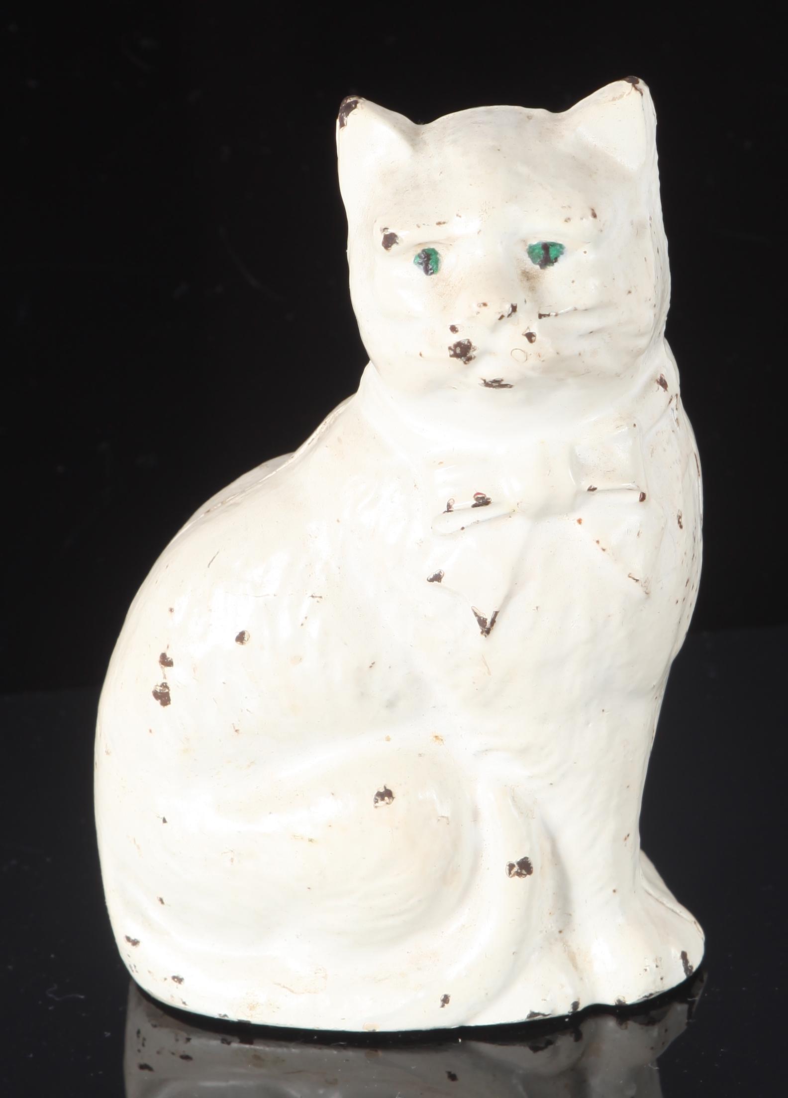 CAST IRON CAT WITH A BOW SEATED - STILL BANK (1 of 4)