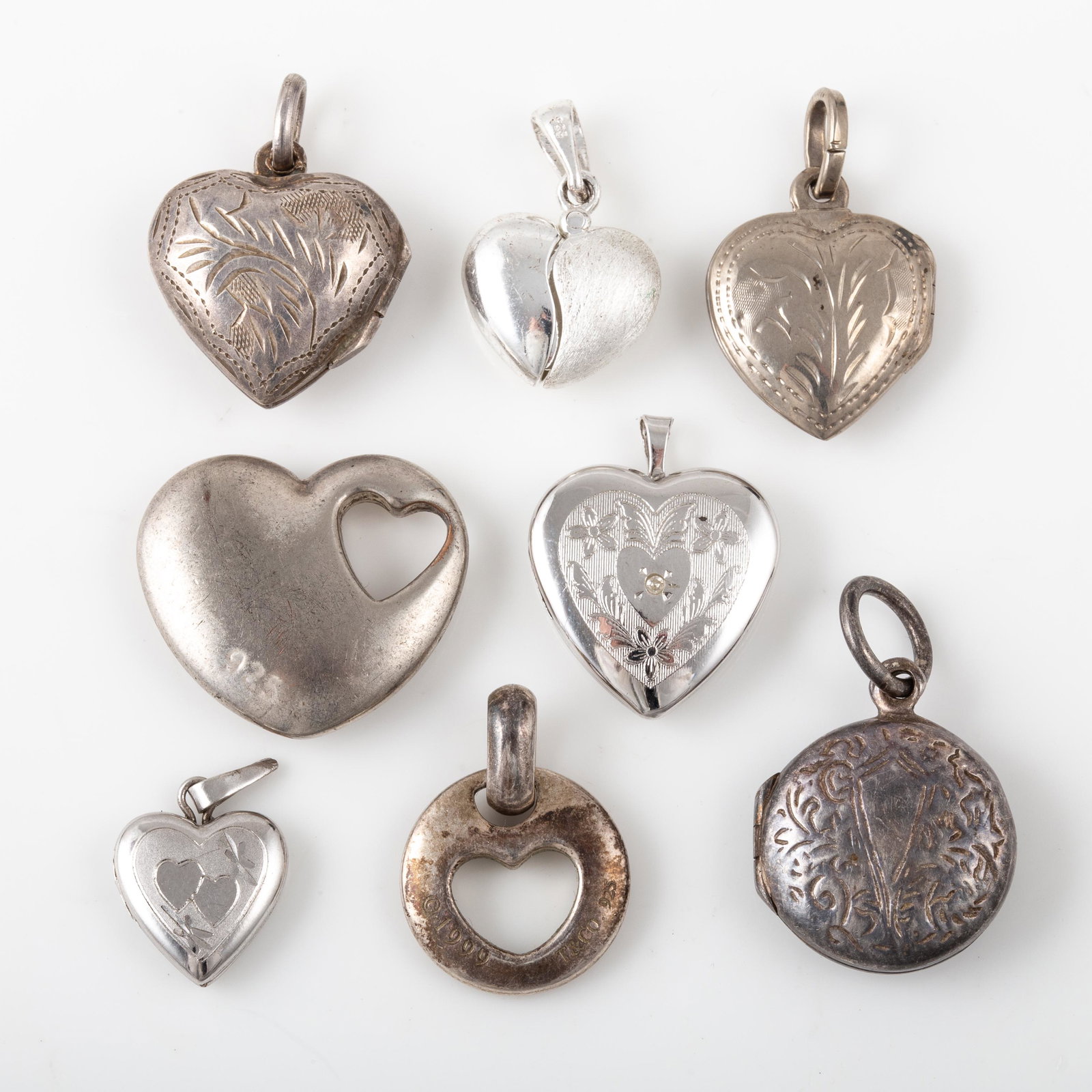 (8) HEARTS & LOCKETS STERLING CHARMS: Includes: (4) heart form lockets, (1) disc locket, (3) heart themed charms, [.73 ozt total], sizes: 5/8" - 1", VG+