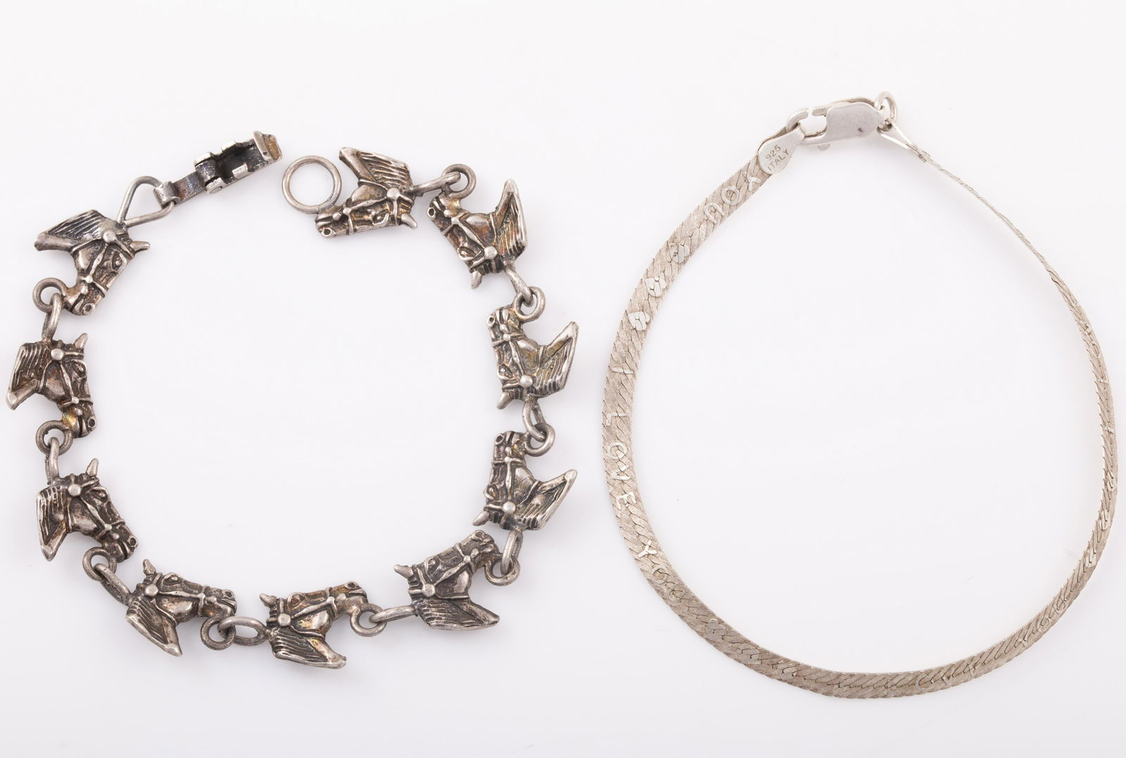(2) STERLING HORSE HEAD + FLAT CHAIN BRACELETS: (1)Horse Head Chain, L - 7" , .31 ozt; (1) Flat Chain - Italy - KA1772, L - 7 1/2", .09 ozt; ( .4 ozt for both. G - VG