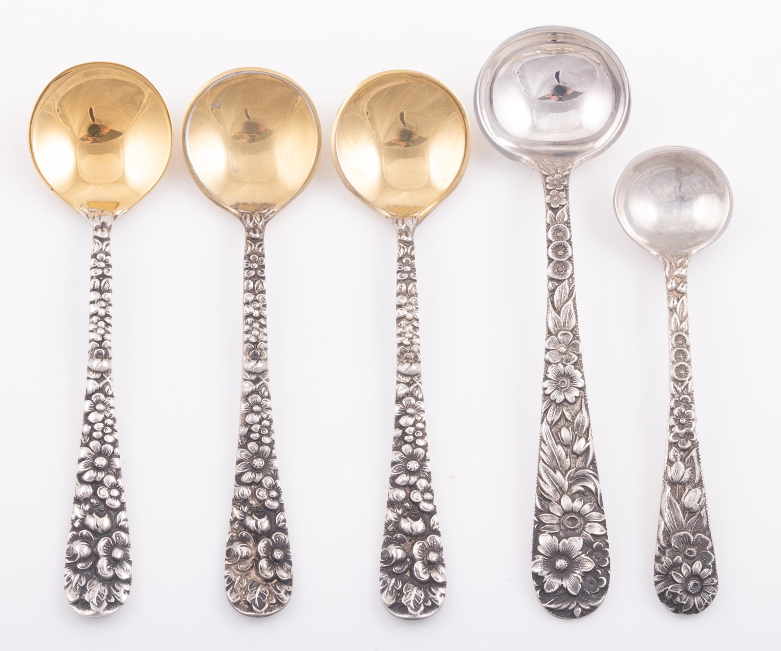 (4) REPOUSSE STERLING SALT SPOONS: includes: (1) Kirk "Repousse" salt spoon, L-2 3/8", .17 ozt; (1) S. Kirk & Son salt spoon, L-3", .29 ozt; (3) Stieff "Rose" salt spoons, vermeil bowls, L-2 3/4", .22 ozt; [1.13 ozt total], EX