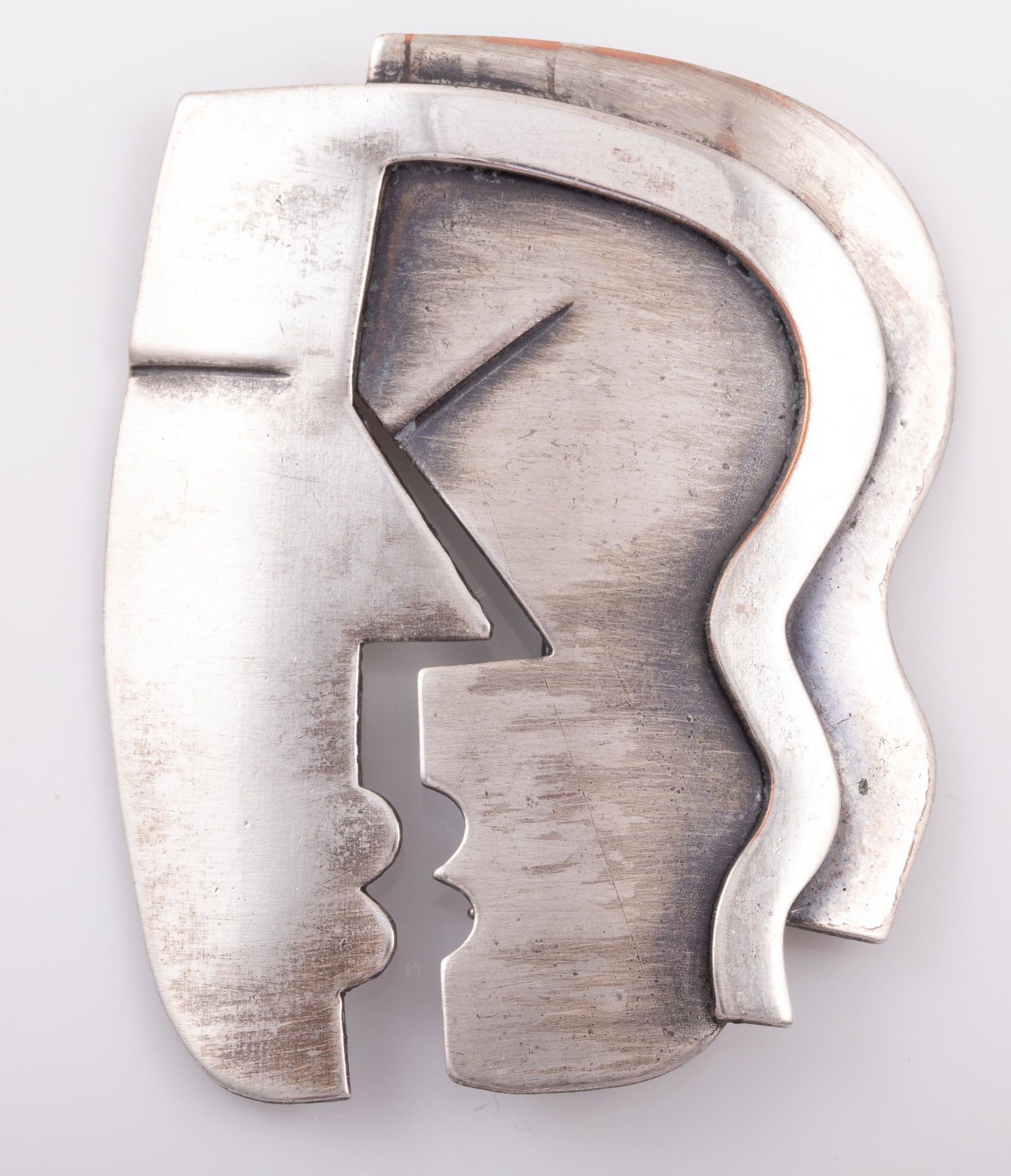 REBAJES SILVER TONE "THE KISS" BROOCH: Modernist design pin , silvertone, some light wear / accretions on front of pin; signed on reverse; 2 1/4" x 1 7/8", G-VG