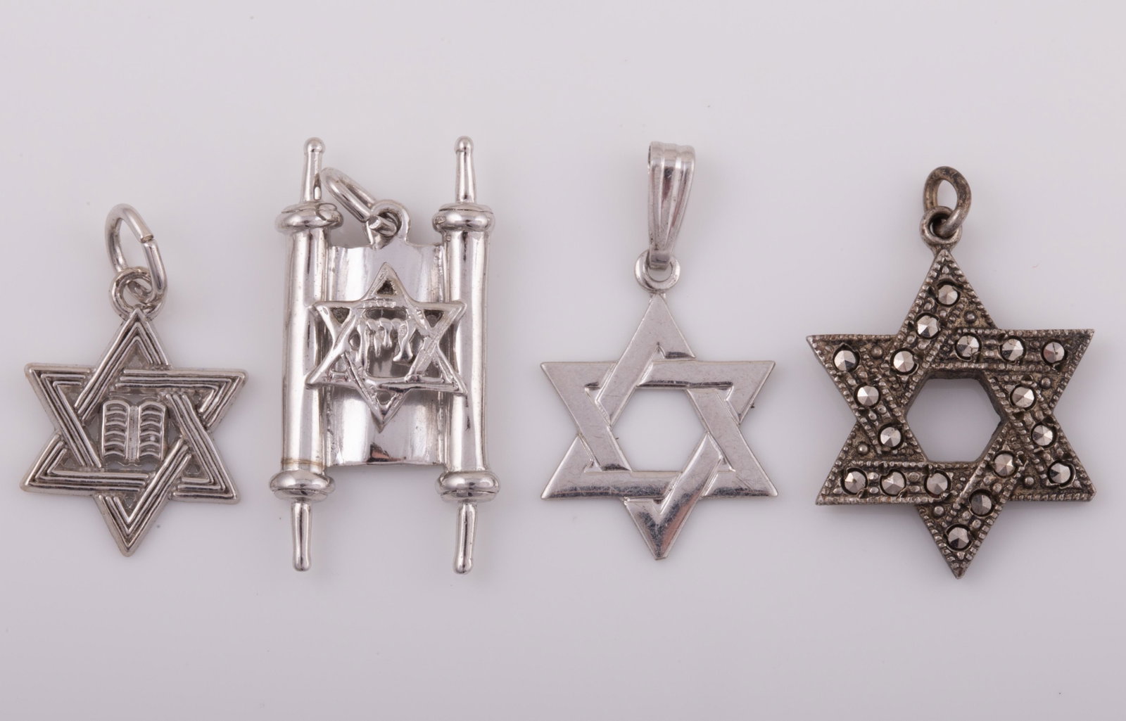 (4) STERLING JUDAIC CHARMS: (1) Marcasite star .22 ozt, L - 1", VG - EX