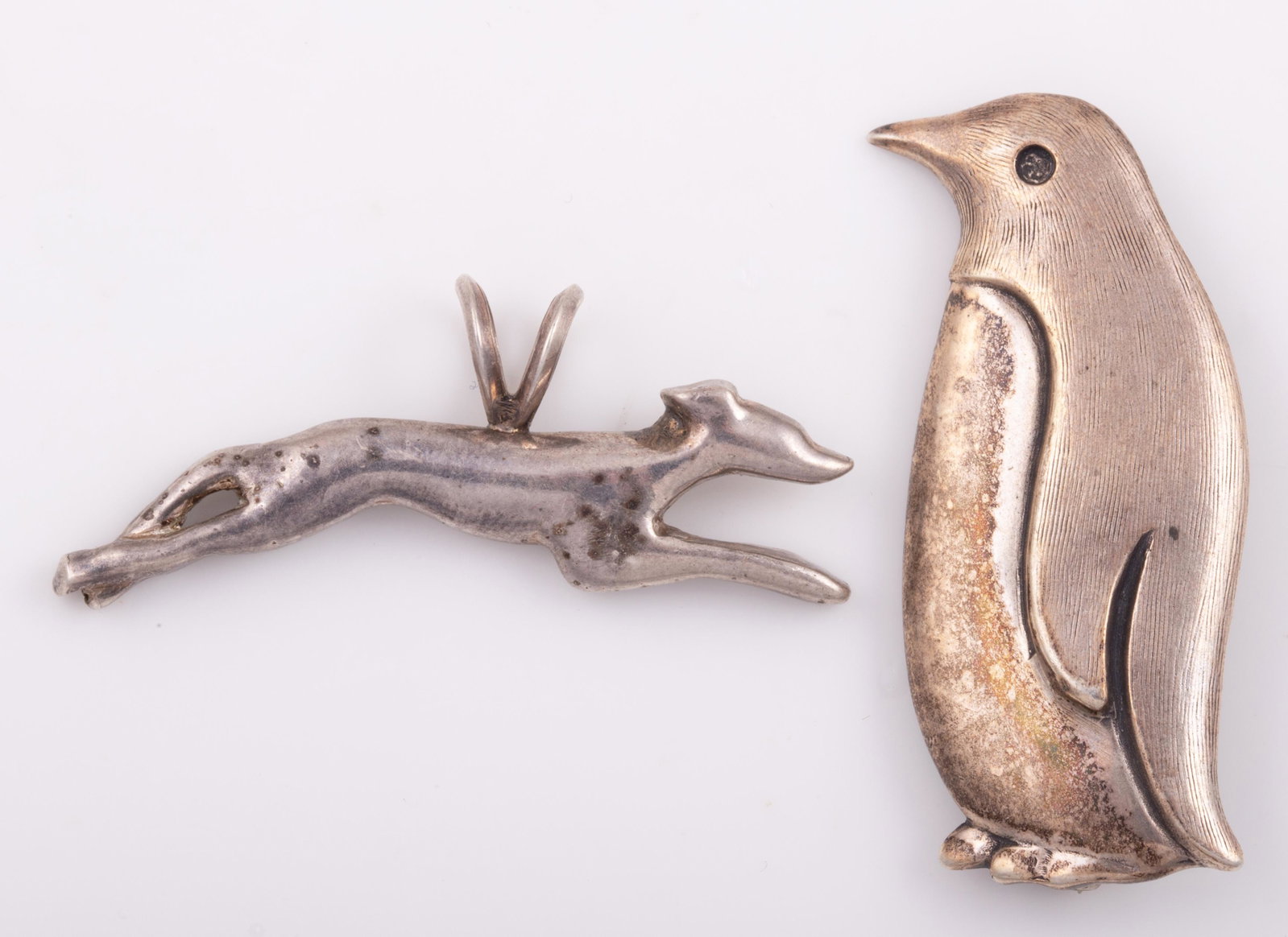 (2) PCS. STERLING DOG DROP & PENGUIN BROOCH: .34 ozt for both, longest: 1 1/2" long, G-VG