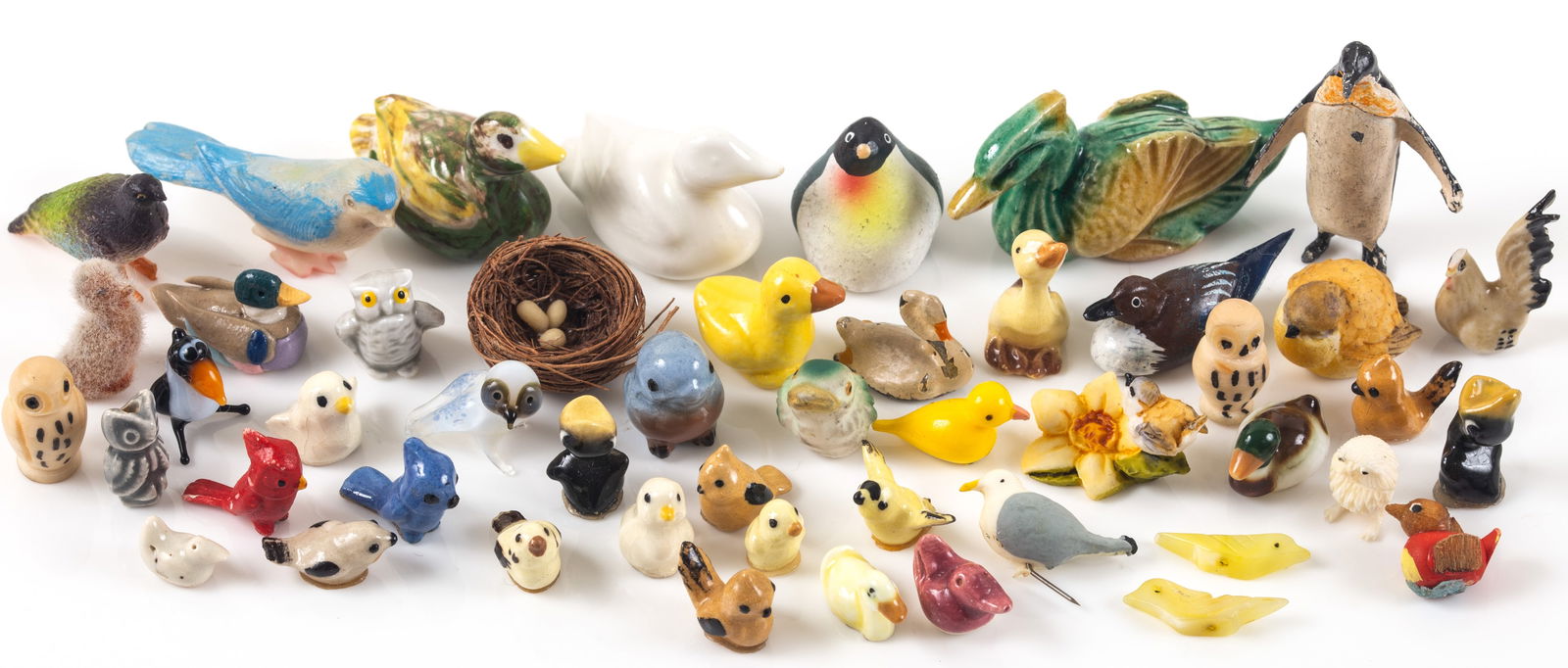 LARGE LOT OF BIRD MINIATURES (48+/-): Includes: pottery, metal, ceramic, glass, bone and plastic; cardinals, owl, pigeons, ducks, finches, blackbirds, penguins, birds nest, etc., largest L-1 3/4", VG