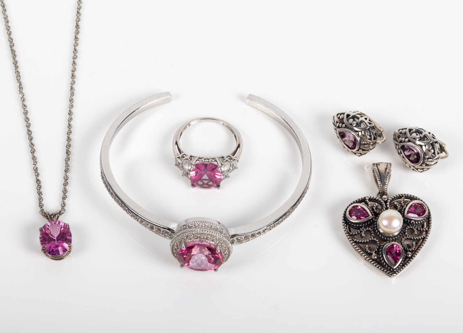 (5) PCS. STERLING & STONE JEWELRY: (1) cuff bracelet with 8 carat round pink stone, L-7 1/4", .78 ozt total; (1) chain necklace with 4 carat oval pink stone drop, L-18", .11 ozt total; (1) heart drop with (3) pear shaped pink stones an