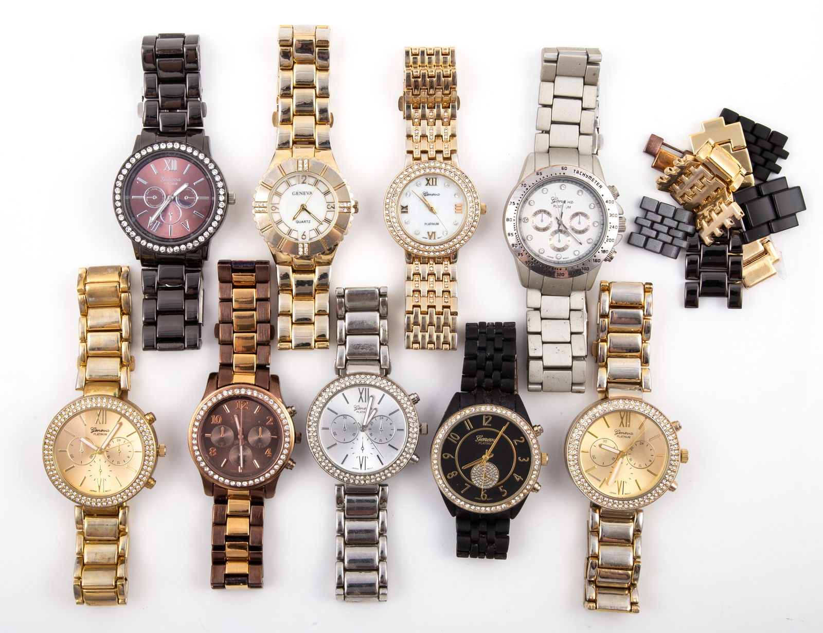 (9) GENEVA LADIES' WRIST WATCHES: Silver tone, gold tone, copper tone and black; need batteries, not running, very minor wear; some have extra links; overall light wear; longest 10", VG-EX