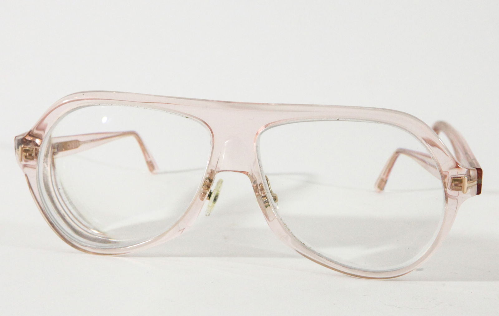 TOM FORD EYEWEAR: Pale pink lucite frames with prescription lenses, frame marked "Tom Ford" "Made in Italy", "ThomasTF732 072 61013 145 0"; L-5 3/4", VG