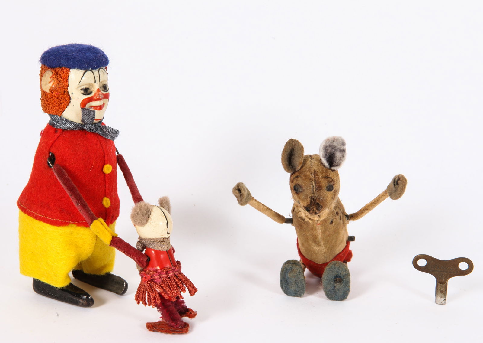 (2) SCHUCO FIGURAL WIND-UPS: CLOWN with MOUSE & TUMBLING MOUSE: (1) tumbling mouse, fabric covered mechanical mouse; moth holes, losses to fabric, ear replaced, staining and darkening to face, fabric bow around neck has deteriorated; wind-up working; (1) dancing m