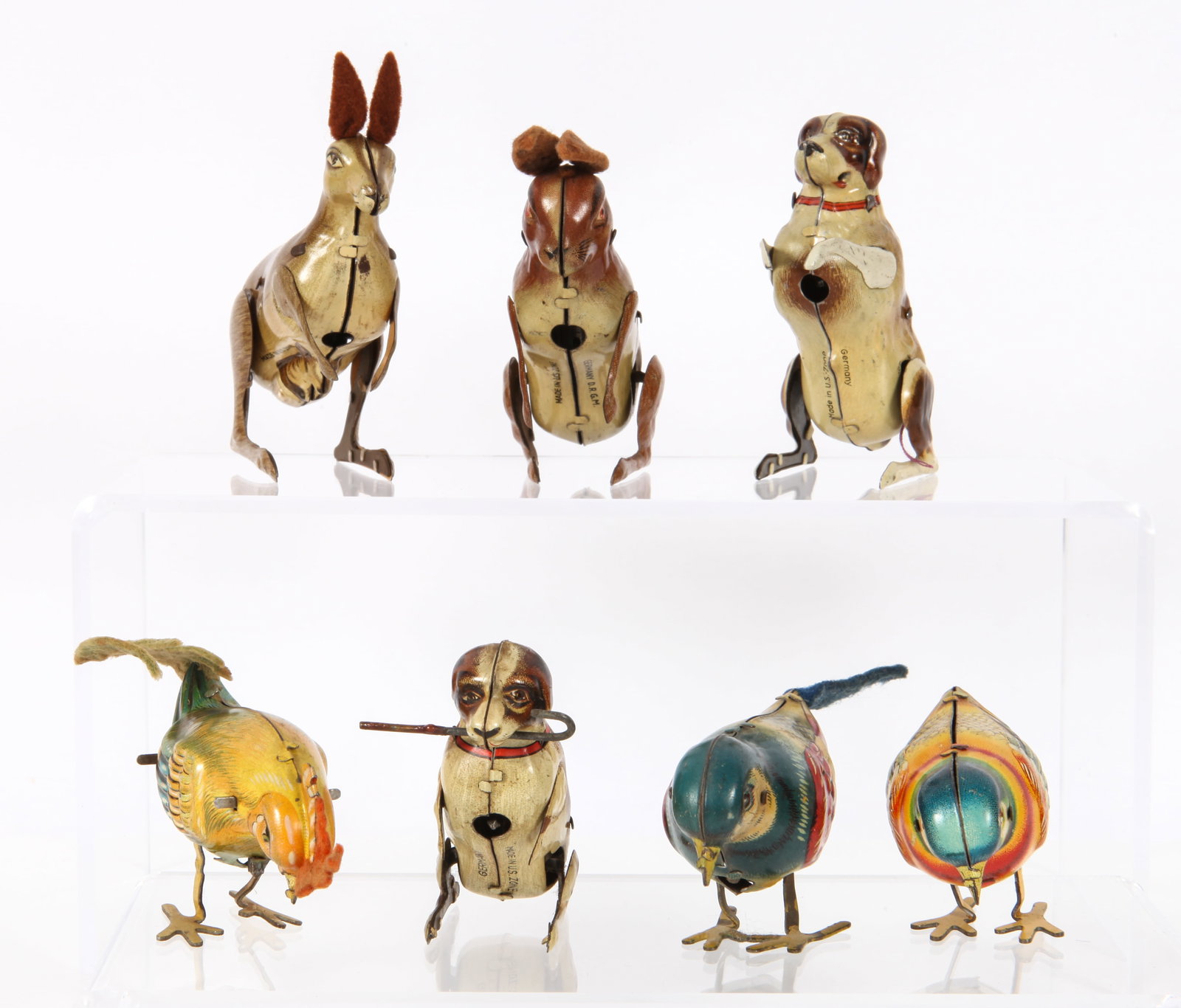 7) TIN LITHO KEY-WIND ANIMAL WIND-UP TOYS: Includes: (1) U.S. Zone Germany wind-up rabbit, not working, felt ears; (1) U. S. Zone Germany wind-up bird, felt tail, not working; (1) German wind-up bird, felt tail significantly damaged, working;