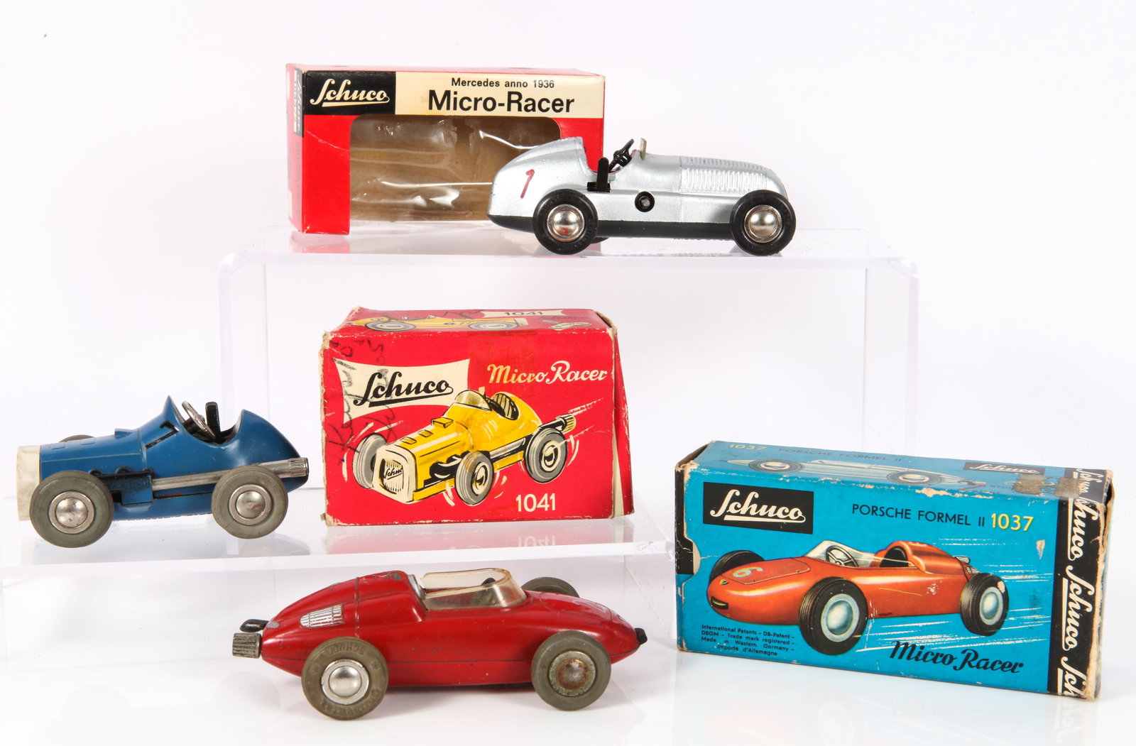(3) SCHUCO MICRO-RACER TOYS - ORIGINAL BOXES: Western Germany, wind-up, painted metal; (1) Mercedes Anno 1936, 1043/2, new in box, retains key (plastic punctured on box); (1) Porsche Formel II 1037, original box, no key, (some paint flakes on car