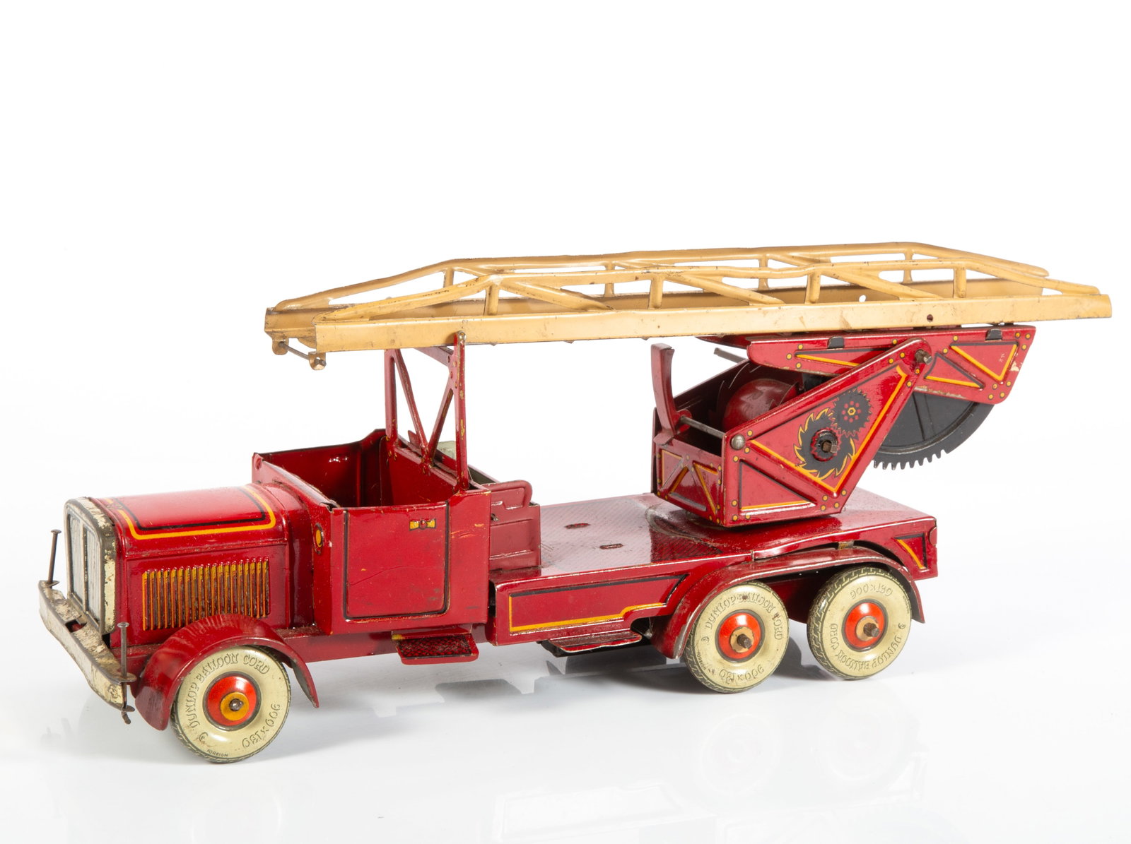 TIN LITHO WIND-UP LADDER WAGON FIRE TRUCK: Possibly Tipp, tin litho wheels marked "Foreign"; truck missing a ladder, missing four riders, some scratches to litho , mostly to flat areas where tower swivels, etc.; brightwork has some plating wea