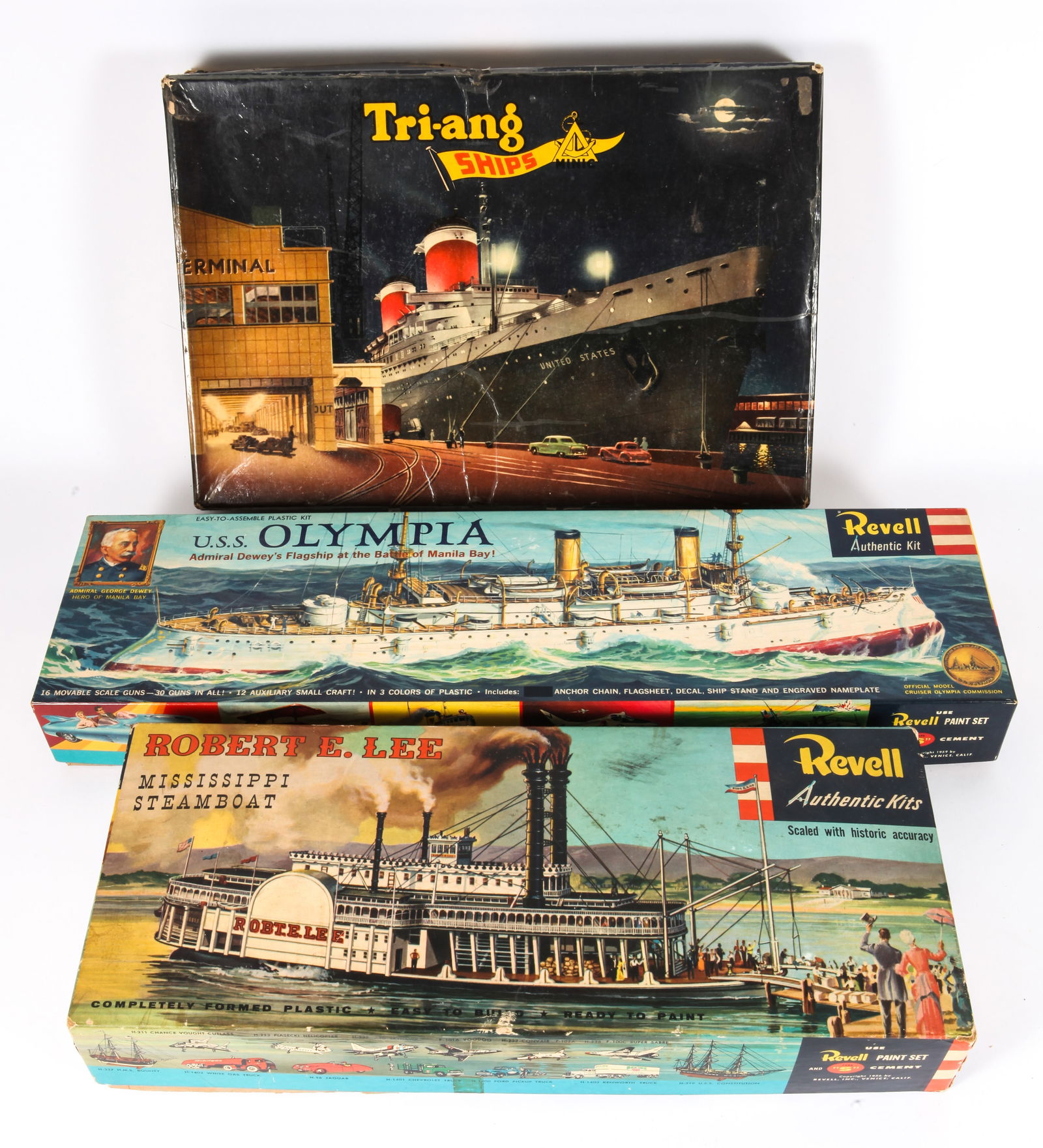 SHIP MODEL KITS - REVELL & TRIANG: (1) Revell Robert E. Lee Mississippi Steamboat, partially built, appears complete, retains decals; (1) Revell U.S.S. Olympia, appears complete; retains paperwork and decals; (1) Triang Minic S.S. Unit