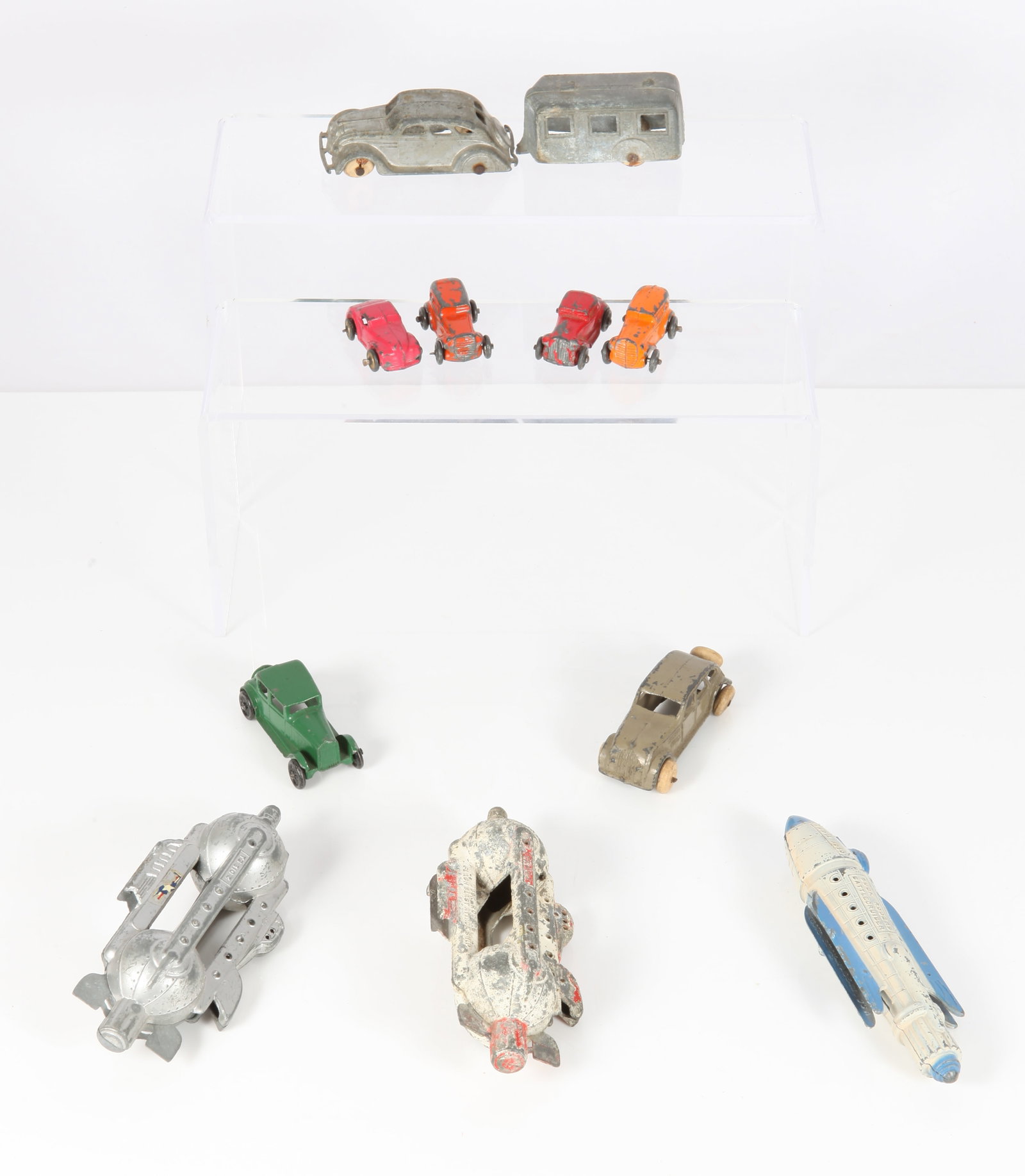 (10) PCS. VINTAGE TOOTSIETOY & DIECAST: Mostly painted; (2) Tootsietoy: Buck Rogers Battlecruiser and Flash Blast Attack Ship; (1) diecast Battlecruiser TS 310Z; (1) Tootsie car and trailer (not painted); (1) Tip Top toy car; (5) unmarked s
