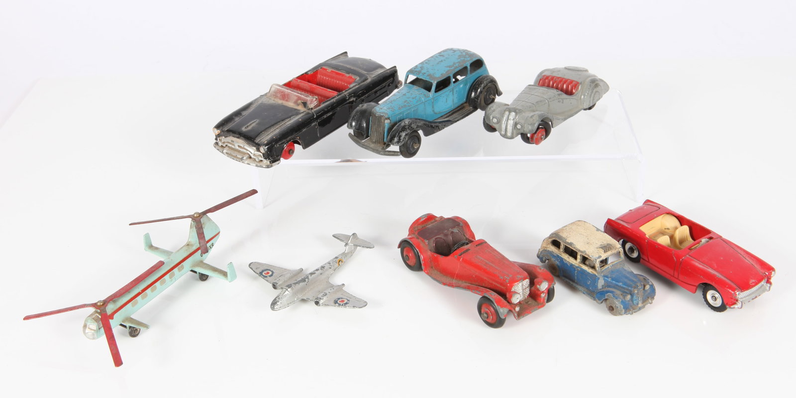 (8) VINTAGE DIE-CAST DINKY TOYS: England; includes: Bristol 173 helicopter #715, Meteor Airplane, Packard #132, Jaguar, Austin taxi, Austin Healey Sprite #112; Armstrong Siddley #36A; condition varies, paint loss, all cars need resto