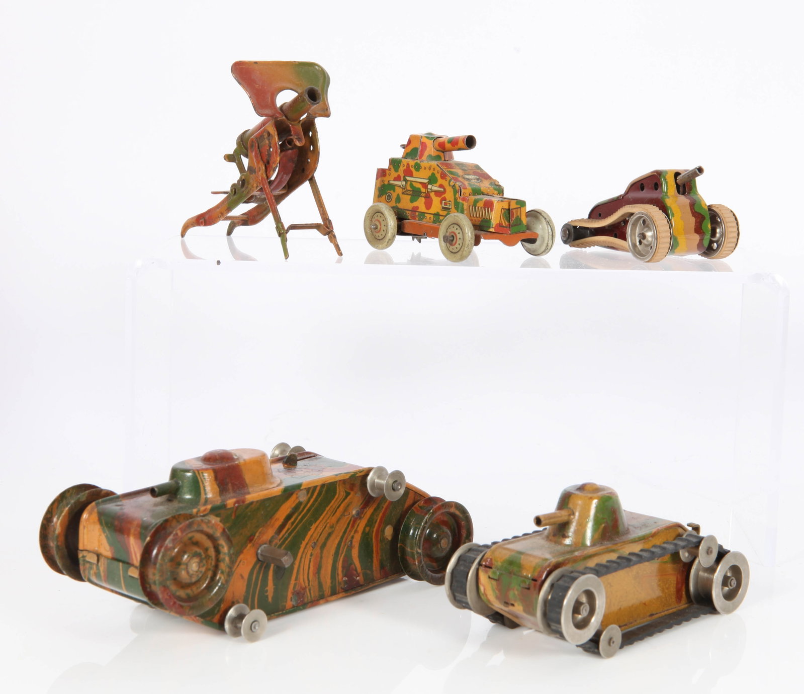 (5) VINTAGE GERMAN MILITARY TOYS: (2) die-cast Marklin, larger one is a key wind-up; works; missing rubber tread; (3) tin litho and die-cast tanks, tin litho machine gun; tanks are key wind, works; tread loose on die-cast tank; no key