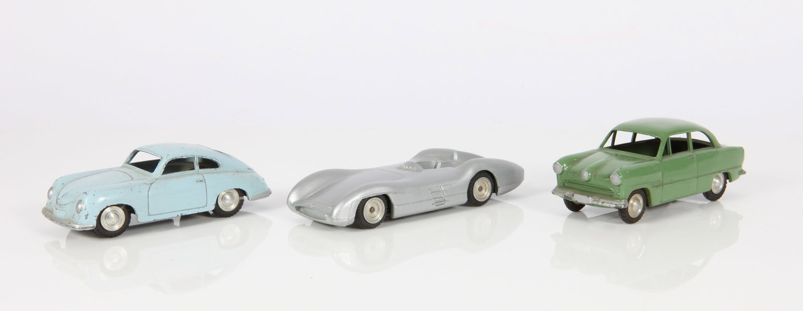 (3) VINTAGE MARKLIN TOY CARS: Die-cast; Germany and Western Germany; (1) Porsche, W. Germany; (1) Mercedes W. Germany; (1) Ford Taurus 15M, 5524/4 Germany; Porsche has minor paint loss; L-3 1/4" x 3 3/4", VG-EX