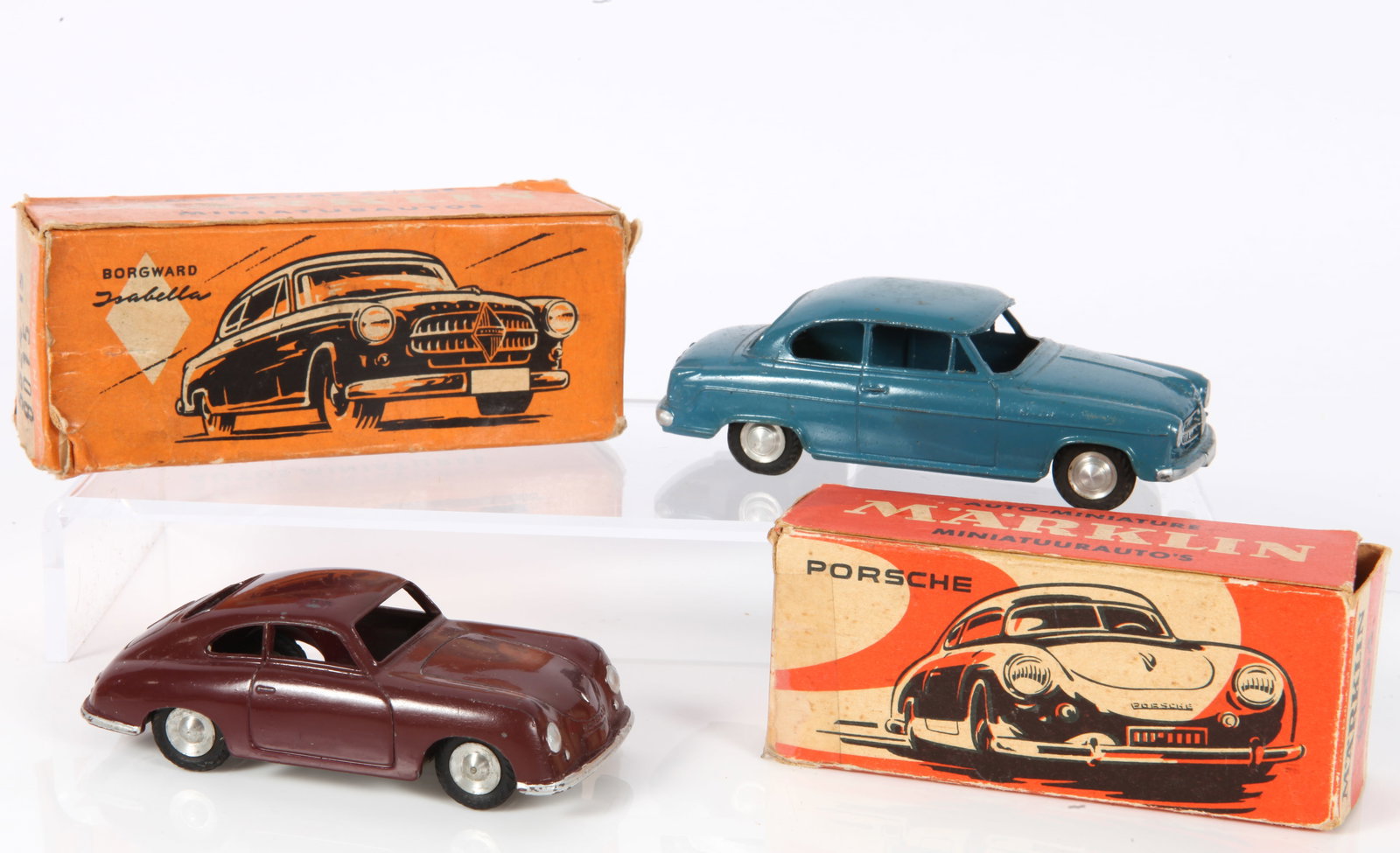 (2) VINTAGE MARKLIN AUTO MINIATURES - ORIGINAL BOXES: German painted die-cast; (1) Porsche #8004, burgundy/brown (a few very tiny scuffs); (1) Borgward Isabella, blue, 5524/15 (some residue on roof); very minor paint loss overall; boxes have edge wear an