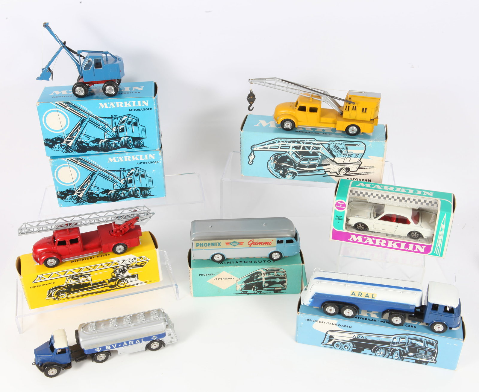(8) MARKLIN TOY MOTOR VEHICLES - ORIGINAL BOXES: Western Germany; die-cast; (2) Autobaggers #8035, (1) Tank Wagon #8032; (1) Autokran #8031; (1) Phoenix Kastenwagon #8017; (1) Feuerwehrauto #8023; (1) truck /#27-BV-ARAL, (1) BMW 2000 CS #1801, (scra