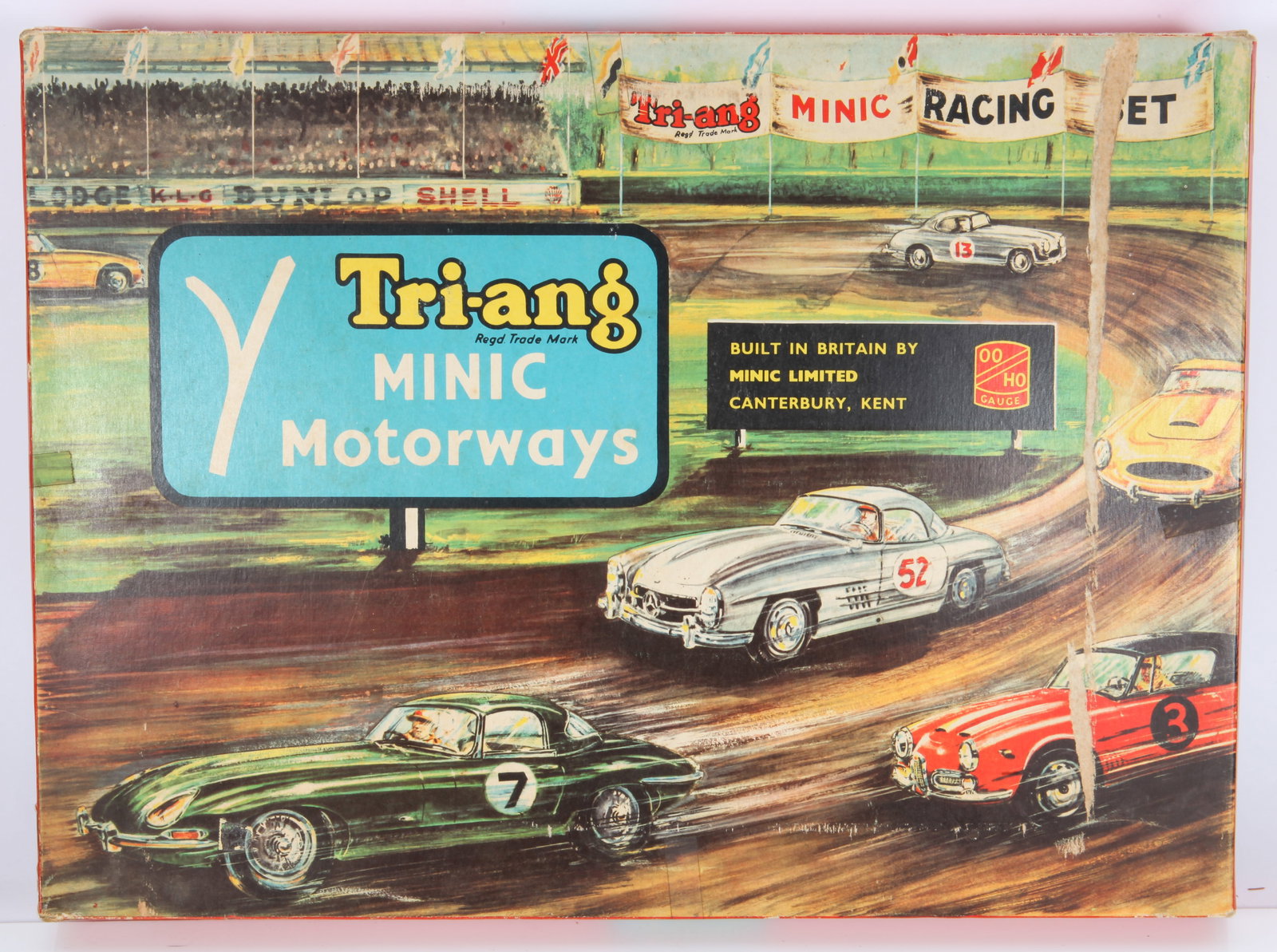VINTAGE TRI-ANG MINIC RACING SET - ORIGINAL BOX: 1960's Britain toy race track and slot car set; set appears complete with very minor wear; die-cast cars, track, instructions, etc. are included; exterior box has minor losses and tape; box: 18 3/4" x