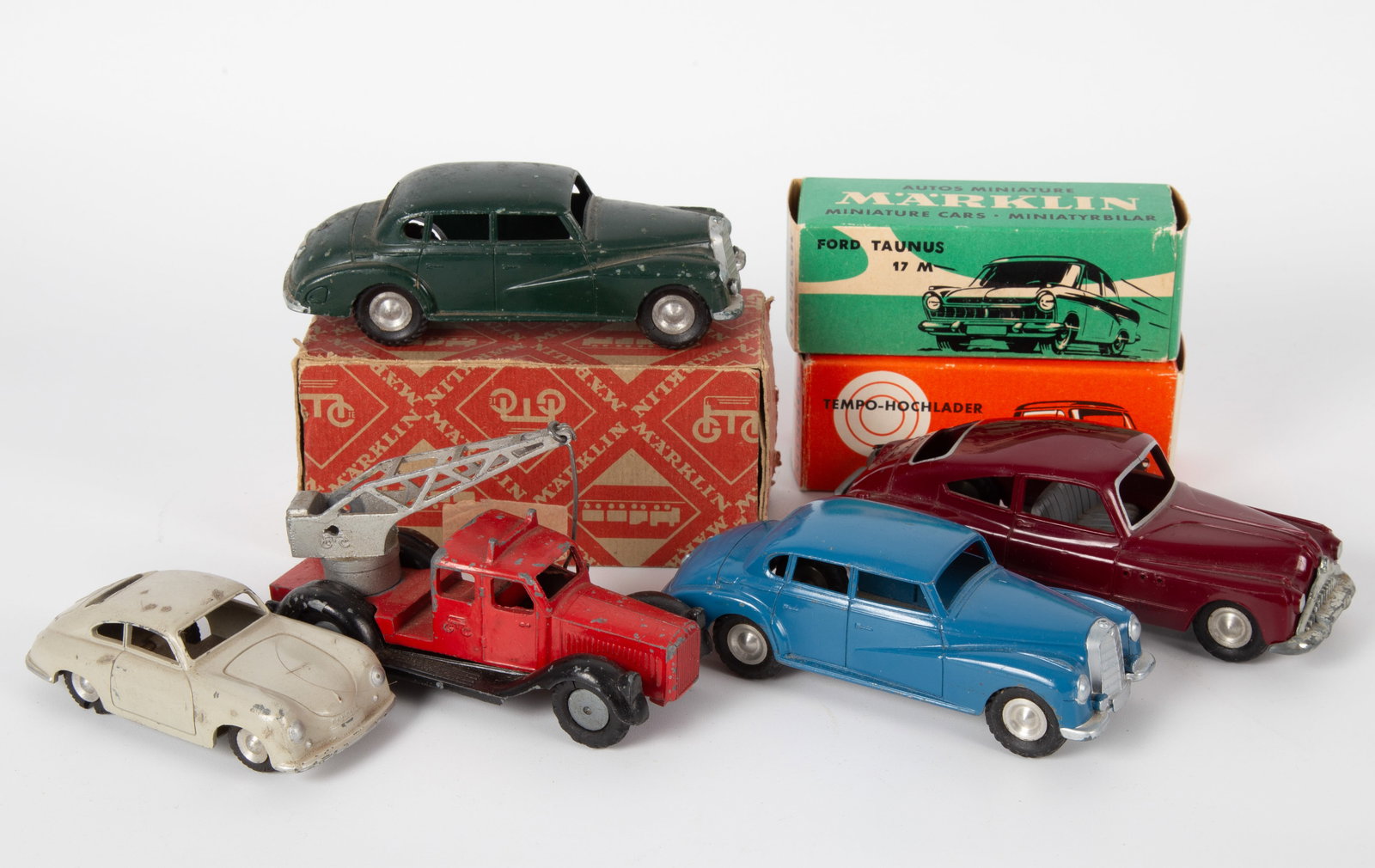 (7) MARKLIN VINTAGE BOXED & UNBOXED VEHICLES: Includes: (1) Marklin 10T wrecker, retains original box marked 5521/36; some paint chips mostly to edges, fenders, etc., box L-4 1/4"; (1) Mercedes, marked Made in Germany; possibly missing hood ornam