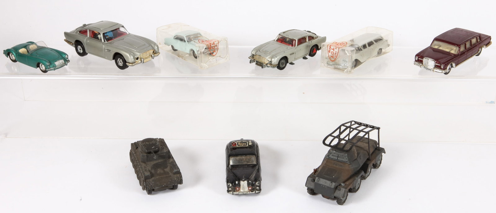 (9+/-) VINTAGE DIE-CAST VEHICLES -CORGI, HUBLEY, MARKLIN: (1) Corgi James Bonds Aston Martin DB5 (considerable wear; (1) Corgi Aston Martin DB5, ejector seat and rear shield working, some scuffs and wear; (1) Corgi Mercedes-Benz 600 Pullman, unsure if gearin
