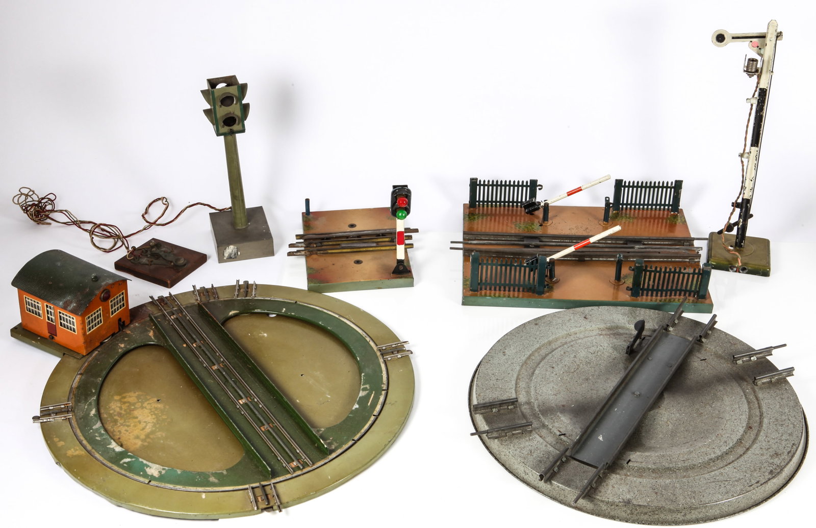 MARKLIN / GERMAN O GAUGE & HO GAUGE TRACK ACCESSORIES: Includes: (1) O Gauge signal with switch, painted metal signal, cloth covered wire, wood mounted mechanical switch, marked "Germany", untested; (1) Marklin O gauge three rail gate, painted tin; (1) Ma