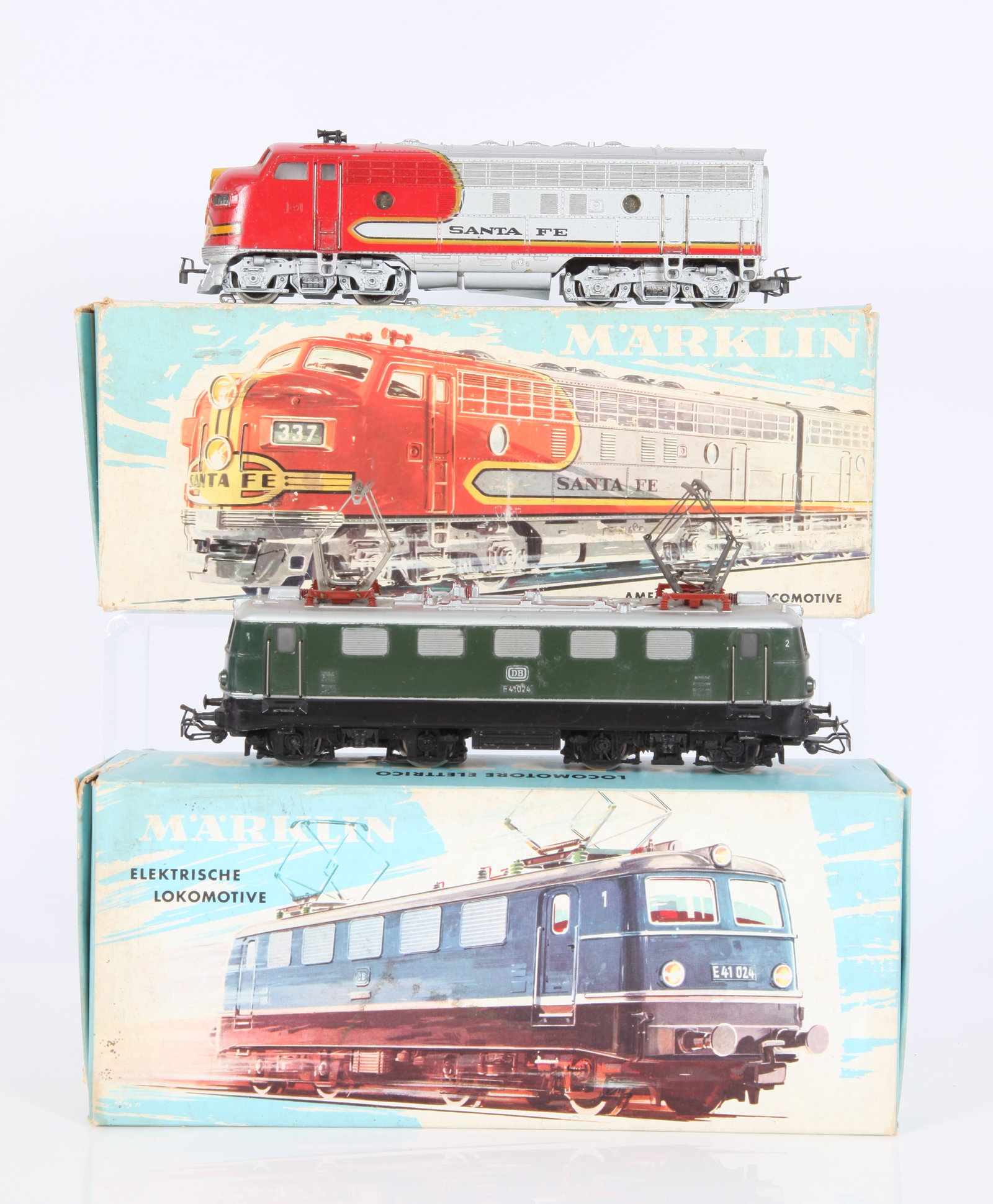 (2) VINTAGE HO MARKLIN LOCOMOTIVES - ORIGINAL BOXES: Western Germany; (1) electric #3037, (1) diesel Santa Fe #3060; trains in great shape; boxes have wear; boxes L-8 1/2" - 9", VG-EX
