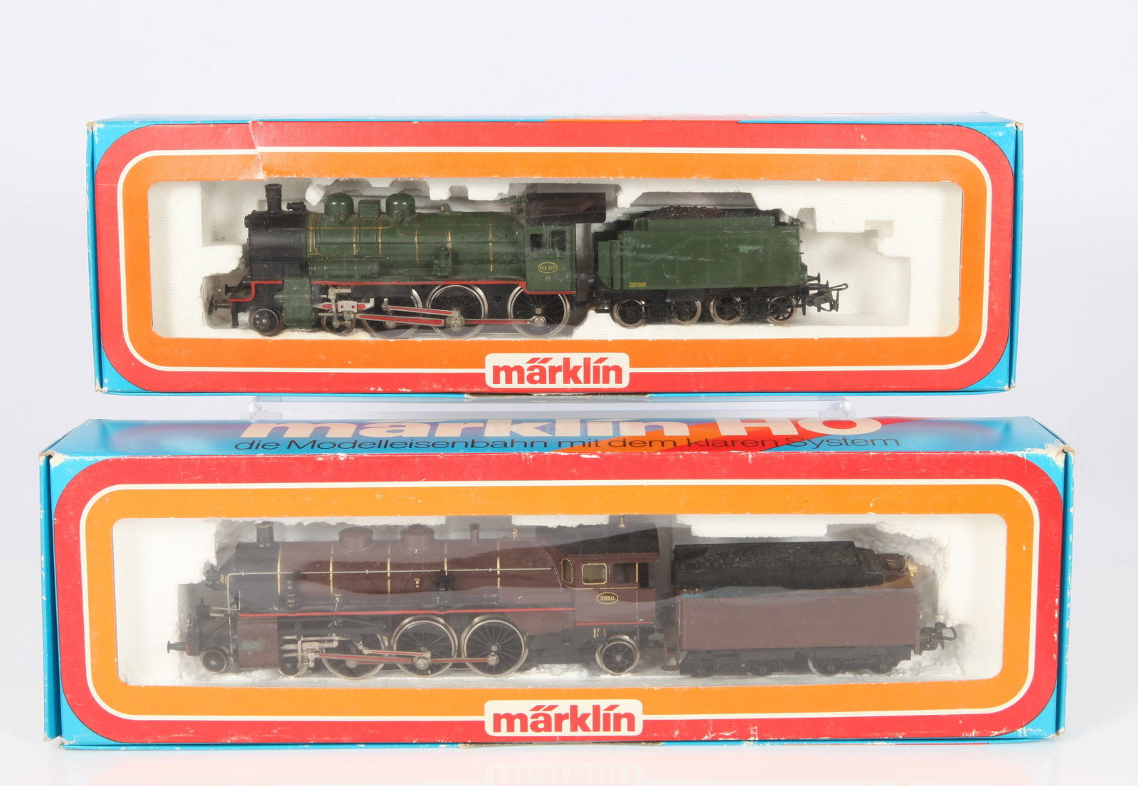(2) MARKLIN HO STEAM LOCOMOTIVES 3111 & 3086 - ORIGINAL BOXES: Includes: (1) Marklin 3111 locomotive, #5920 with tender, appears unplayed with, in original display box; (1) Marklin 3086 locomotive #64119 with #22301 tender, appears unplayed with, in original disp