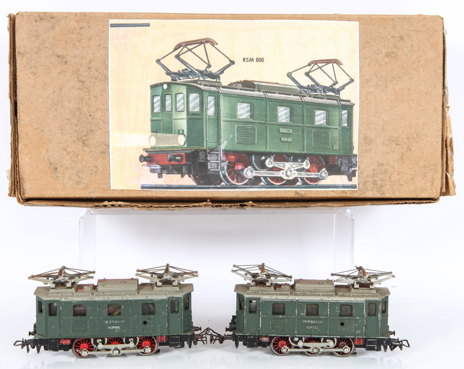 (2) MARKLIN RSM 800 ELECTRIC LOCOMOTIVES: HO Gauge; painted cast metal; (2) headlamps; pantographs on roof; some paint chips and wear; (1) engine housing is loose from mechanism; both untested; L-4 7/8", G-VG