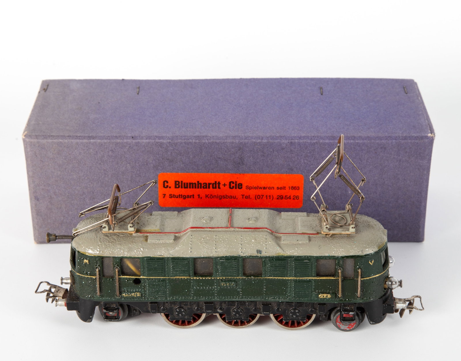 MARKLIN HS800 ELECTRIC LOCOMOTIVE - DIECAST: Circa 1950's; dark green locomotive with grey roof; in cardstock box; paint seems bubbled; engine untested; box L-8"; G-VG