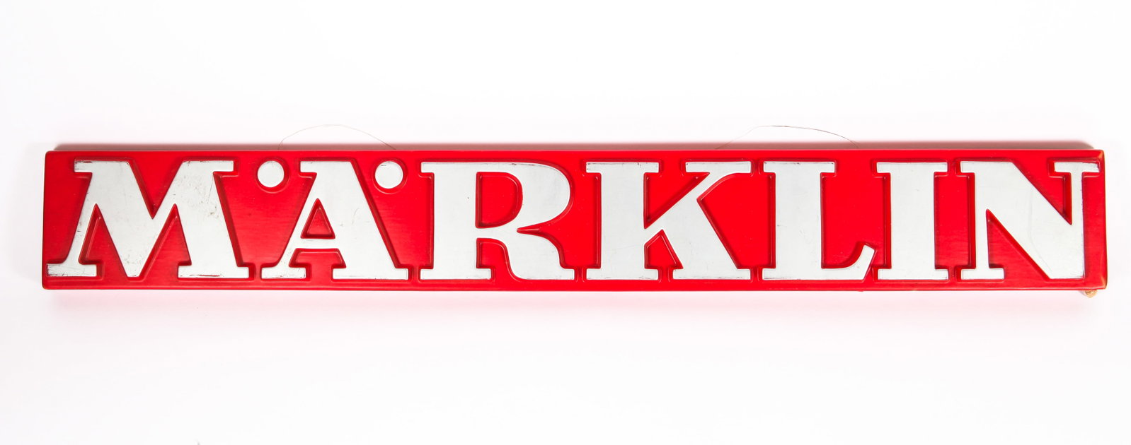 MARKLIN ADVERTISING SIGN: Thermo-form plastic two color "MARKLIN" store display sign, cardboard backing with wire hanger, some age wear and scuffs, L-31 1/2", VG