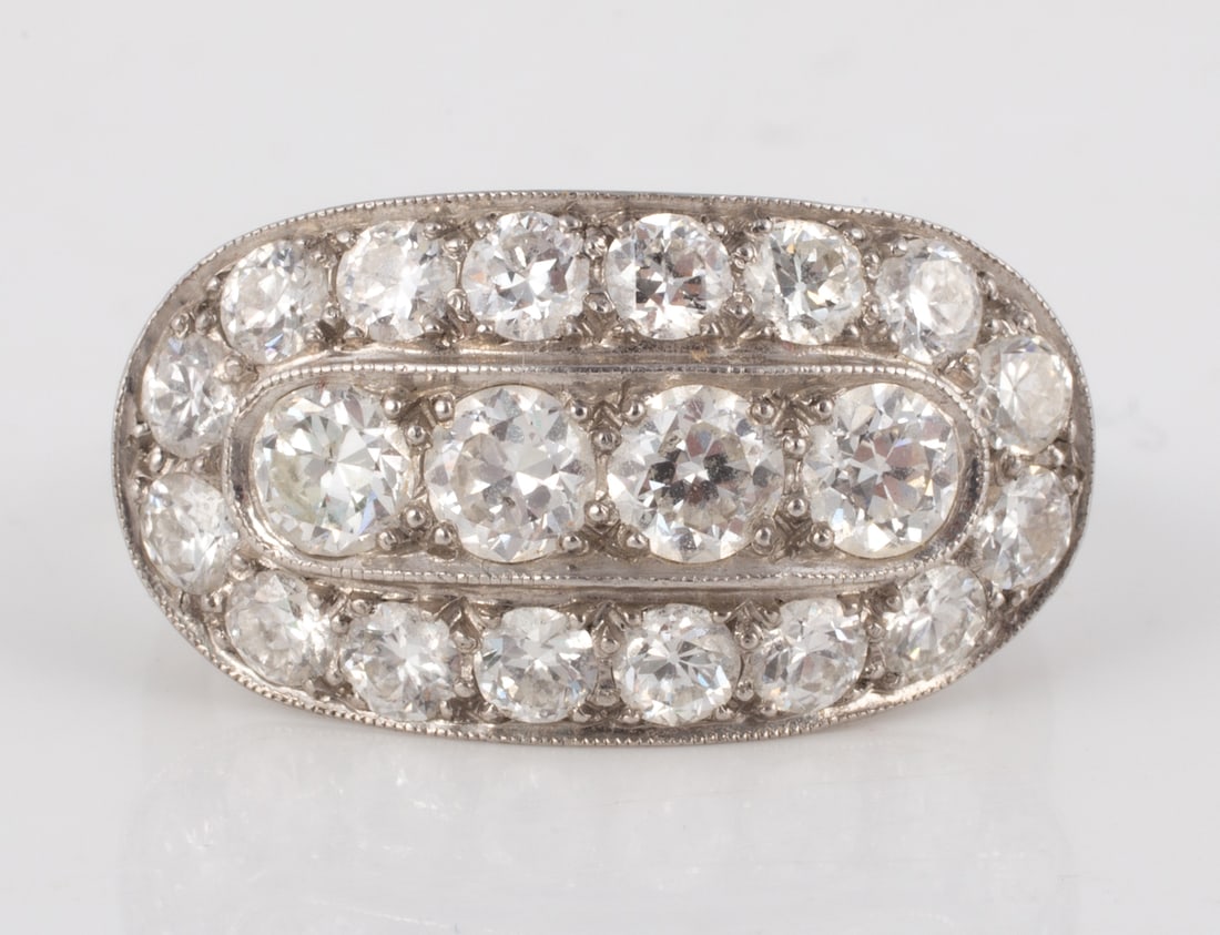 UNMARKED WHITE GOLD DIAMOND RING: Unmarked but tests 18K; set with (4) central .20 carat +/- round diamonds, surrounded by (16) .10 carat +/- round diamonds; ring size 9, [3.82 dwt total], SI1 - SI2 clarity, I-J color; approx. 2 carat