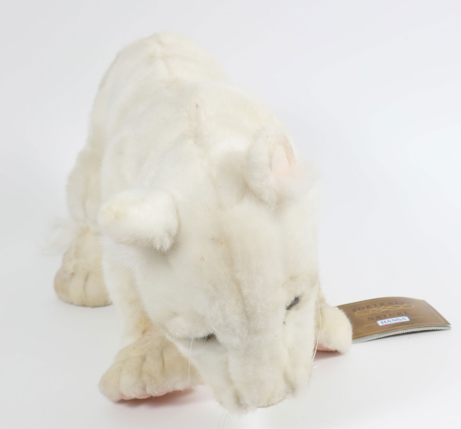 HANSA WHITE LION'S CUB PLUSH ANIMAL: #5237 "White Lions Cub Floppy"; retains cloth tag and paper tag; H-11", L-15", VG-EX