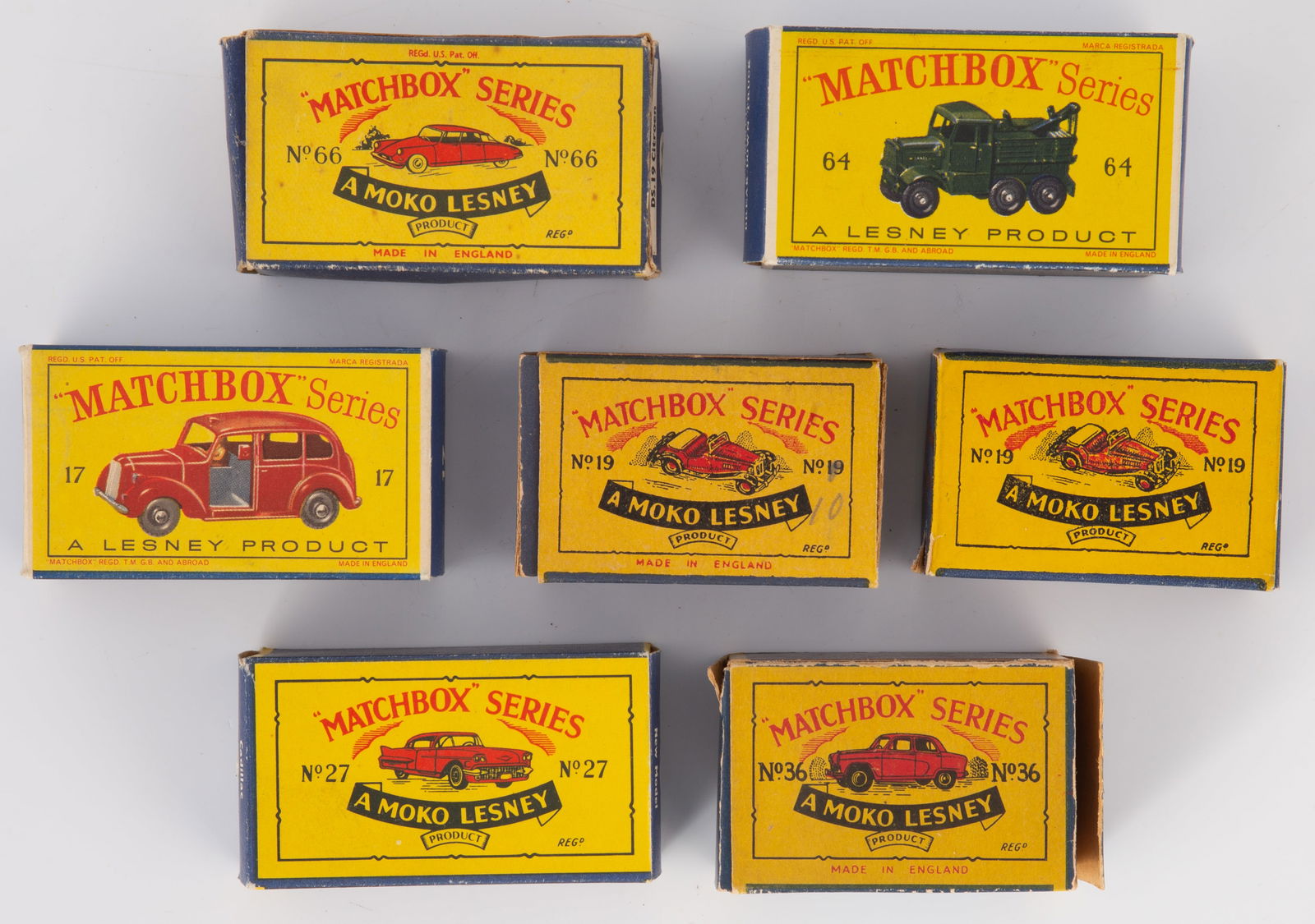 (7) VINTAGE MATCHBOX EMPTY BOXES: Includes: (1) No. 66 DS 19 Citroen, (1) No. 17 Metropolitan Taxi; (1) No 64 Scammel Break Down Truck, (1) No.27 Cadillac New Model; (2) No. 19, 1-with detached inner flap, 1- with two detached inner f