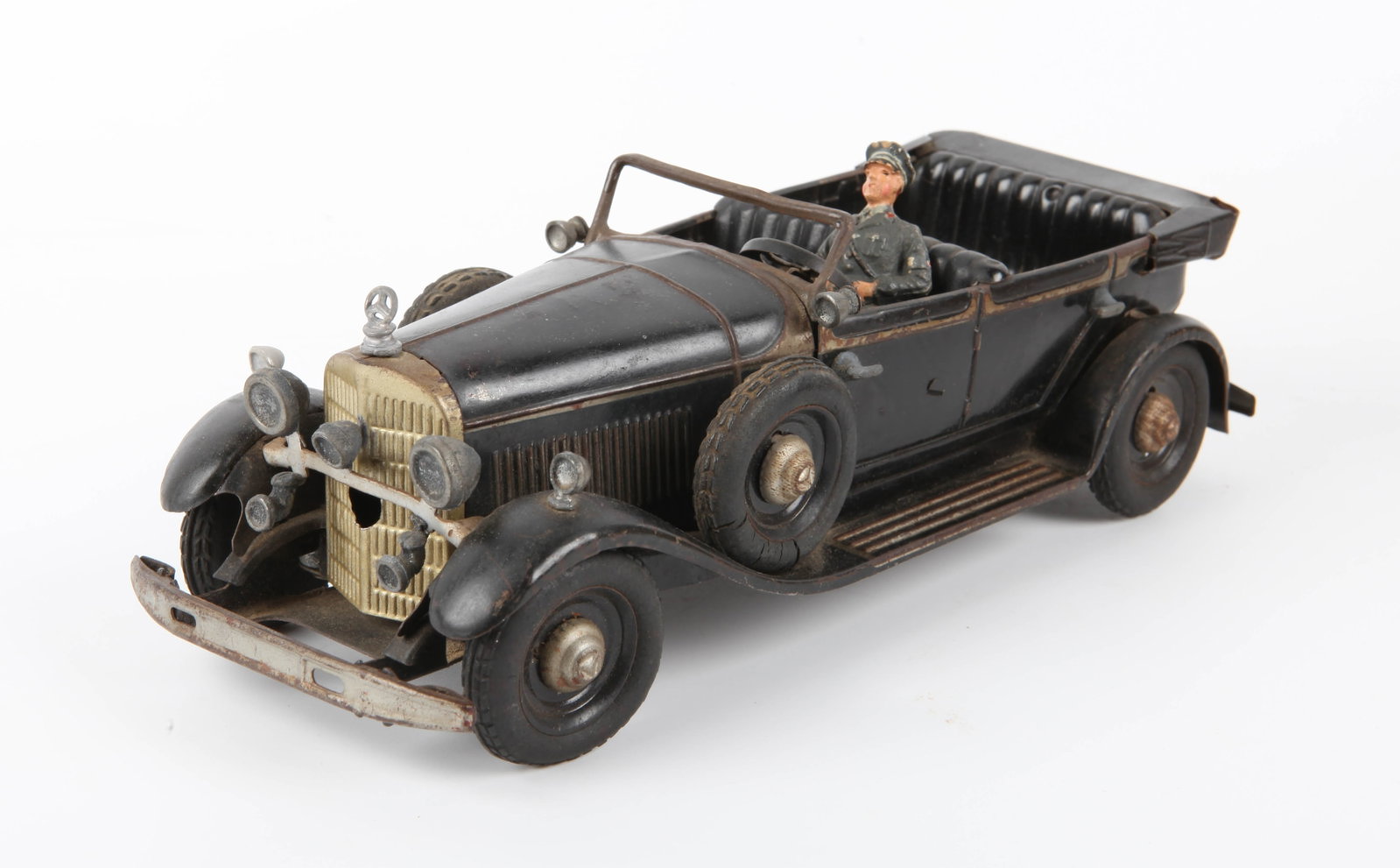 TIPP & CO WAGEN DES FUHRERS CLOCKWORK TOY: Painted tinplate wind-up Mercedes; rubber tires; brightwork has dulled; retains (1) seated original passenger; clockwork mechanism not working; age wear to painted surfaces; fatigue to rubber tires; s
