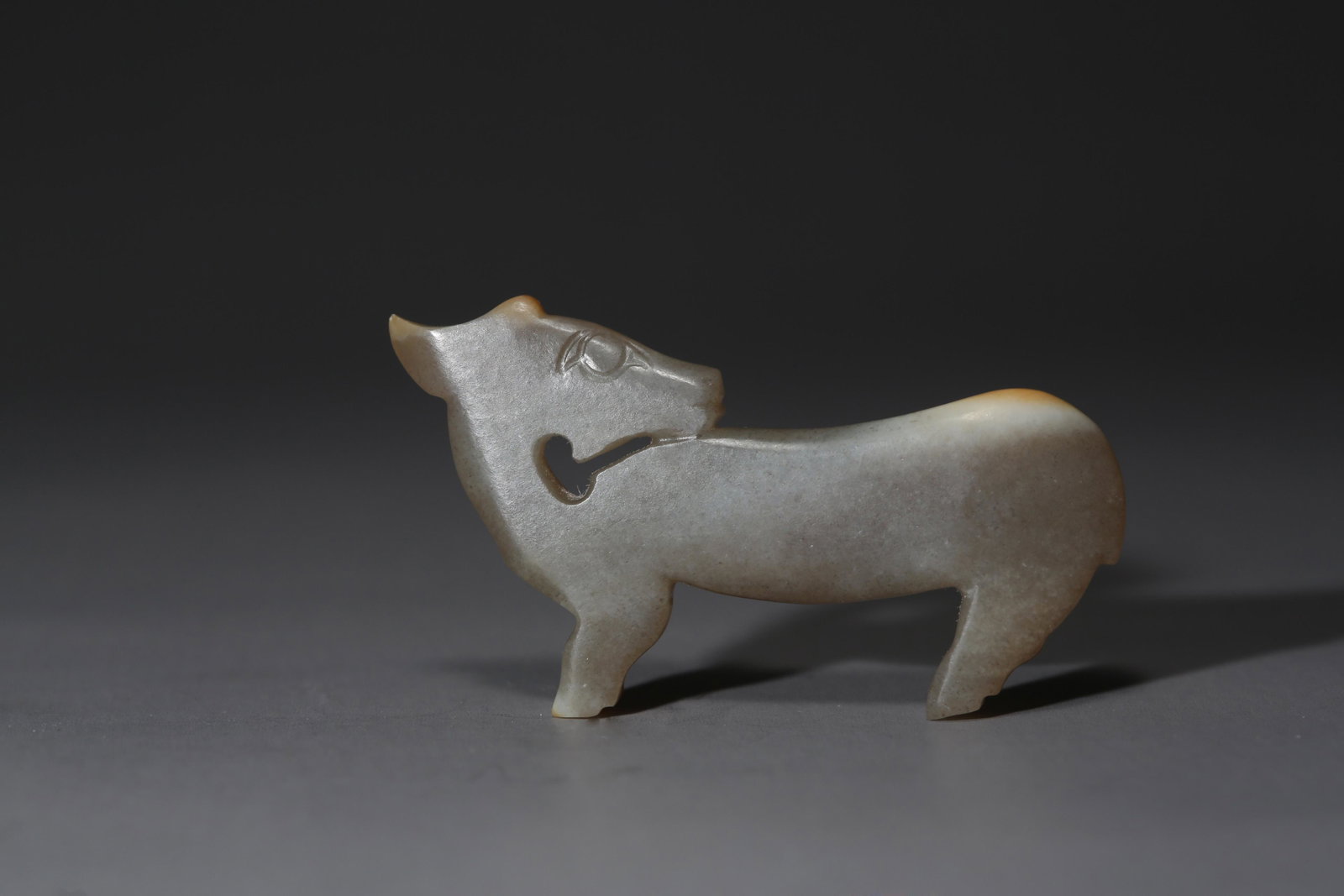 A Jade Deer Shang Dynasty: Size:length 53mm Higth 37mm Date:Bc1600-bc1046 Provenance: China.
