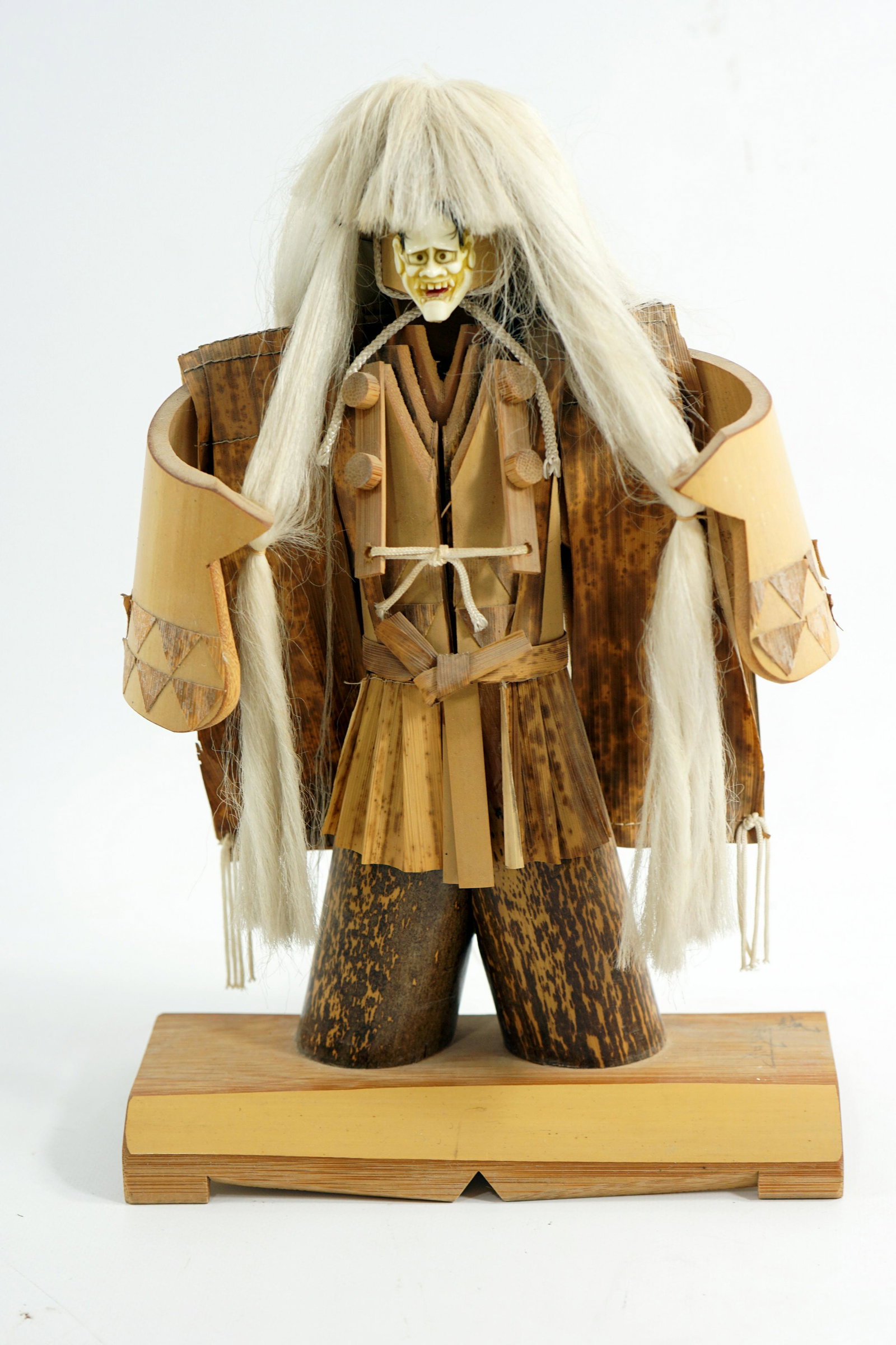 An ancient Japanese doll made of impressive and: An ancient Japanese doll made of impressive and ceremonial handmade bamboo, signed in the late 19th century, early 20th century, size 28 * 19 cm