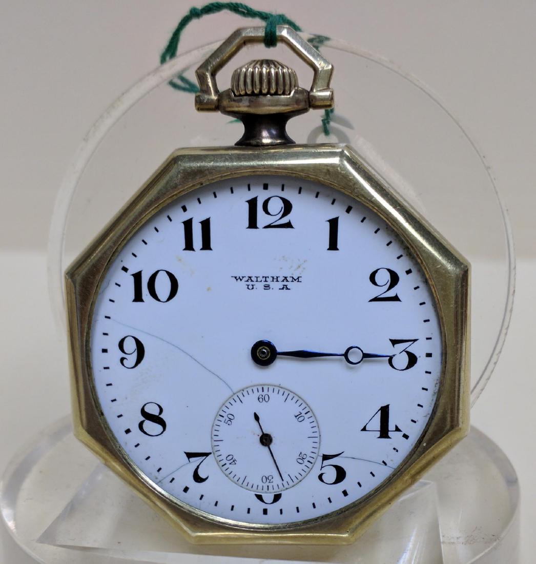 Pocket watch A.W.W. Co. Waltham Mass Pocket Watch: Pocket watch A.W.W. Co. Waltham Mass Pocket Watch Rare octagonal 14k yellow gold open face swing out case packet watch by Waltham. Dial signed Waltham USA circa 1920’s Inside case back is marked: El