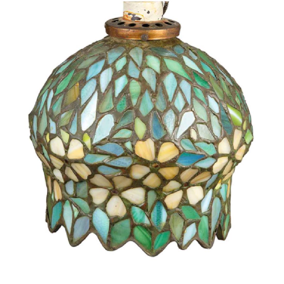 American Leaded Glass Shade: American Leaded Glass Shade Attributed to Apollo Studios, New York, first quarter of the 20th century Of blossom form, in striated amber, green and blue, irregular rim. Height 7 1/8 inches. If you wou