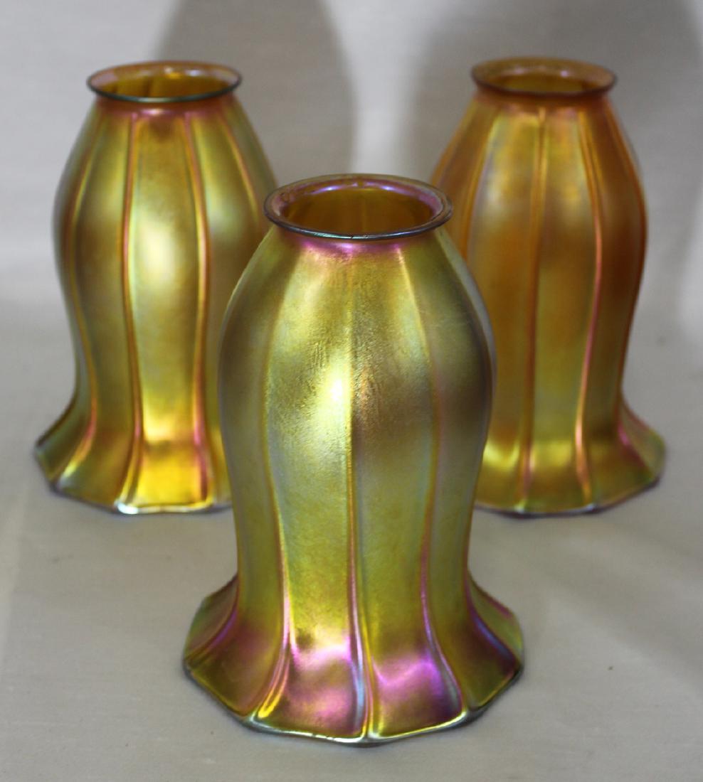 A set of three Quezal Glass Lamp Shades