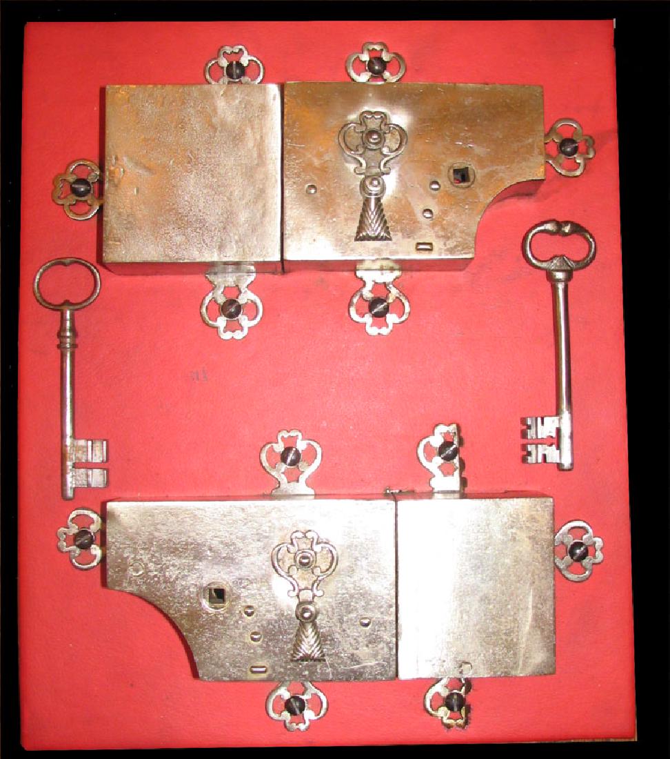 Group of French 18 Century Iron Locks: Group of French 18 Century Iron Locks 18th Century Comprising two irons mounted on a panel with two keys