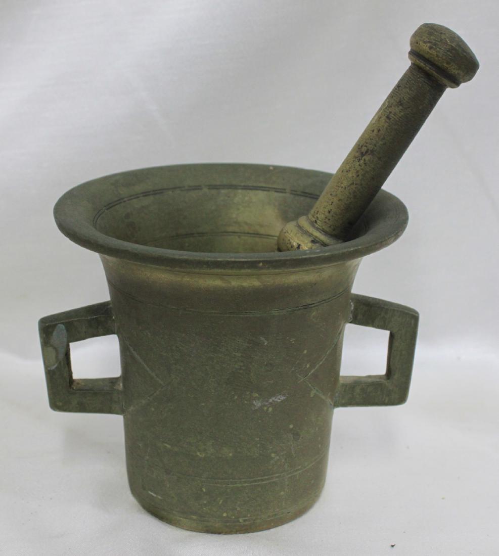 18TH century Italian Mortar: 18TH century Italian Mortar With Pestle. Size 4 3/4 inches height and opening is 5 and the Pestle is 7 1/2 inches.